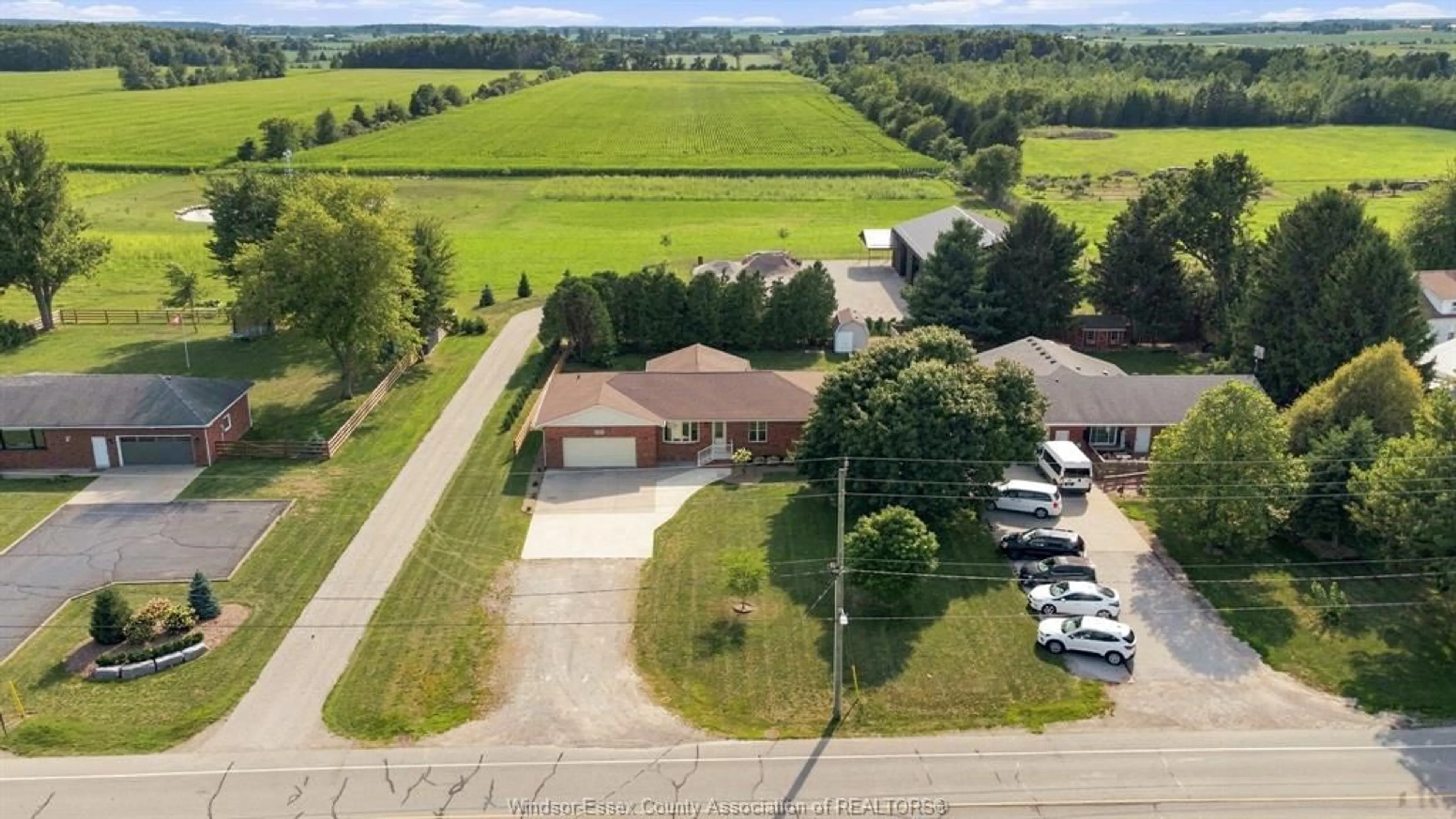 A pic from outside/outdoor area/front of a property/back of a property/a pic from drone, water/lake/river/ocean view for 164 COUNTY ROAD 34, Cottam Ontario N0R 1B0