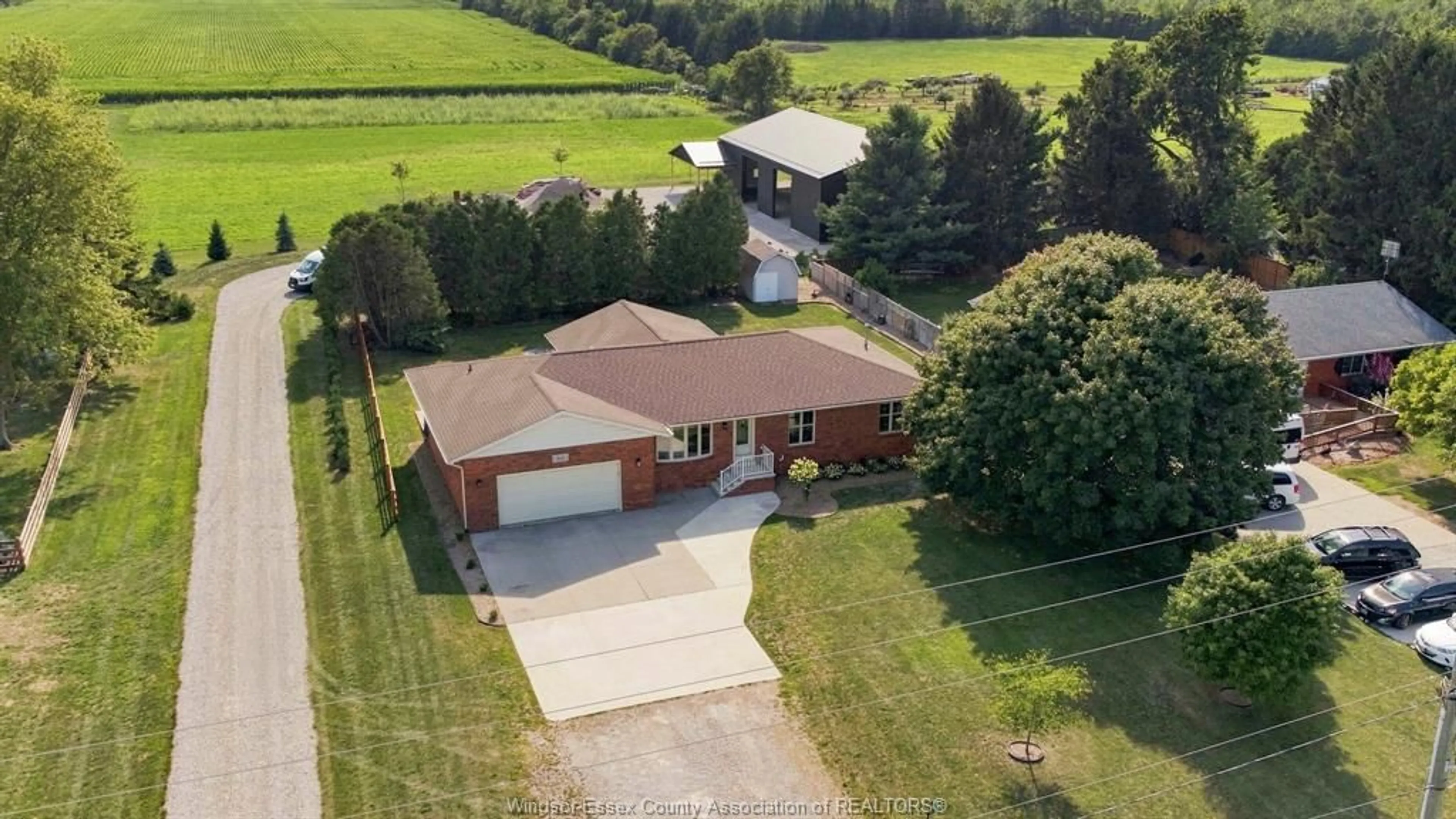 A pic from outside/outdoor area/front of a property/back of a property/a pic from drone, unknown for 164 COUNTY ROAD 34, Cottam Ontario N0R 1B0