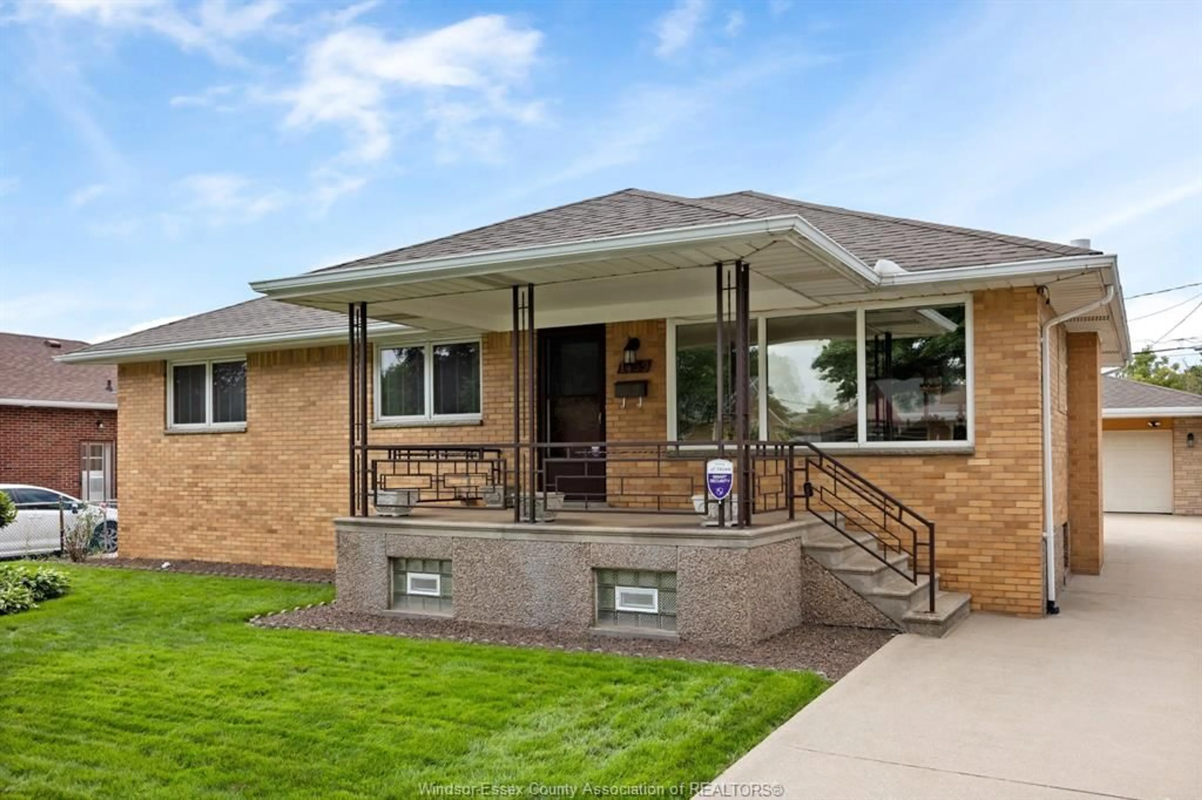 Home with brick exterior material, street for 1459 PARTINTON Ave, Windsor Ontario N9B 2P7