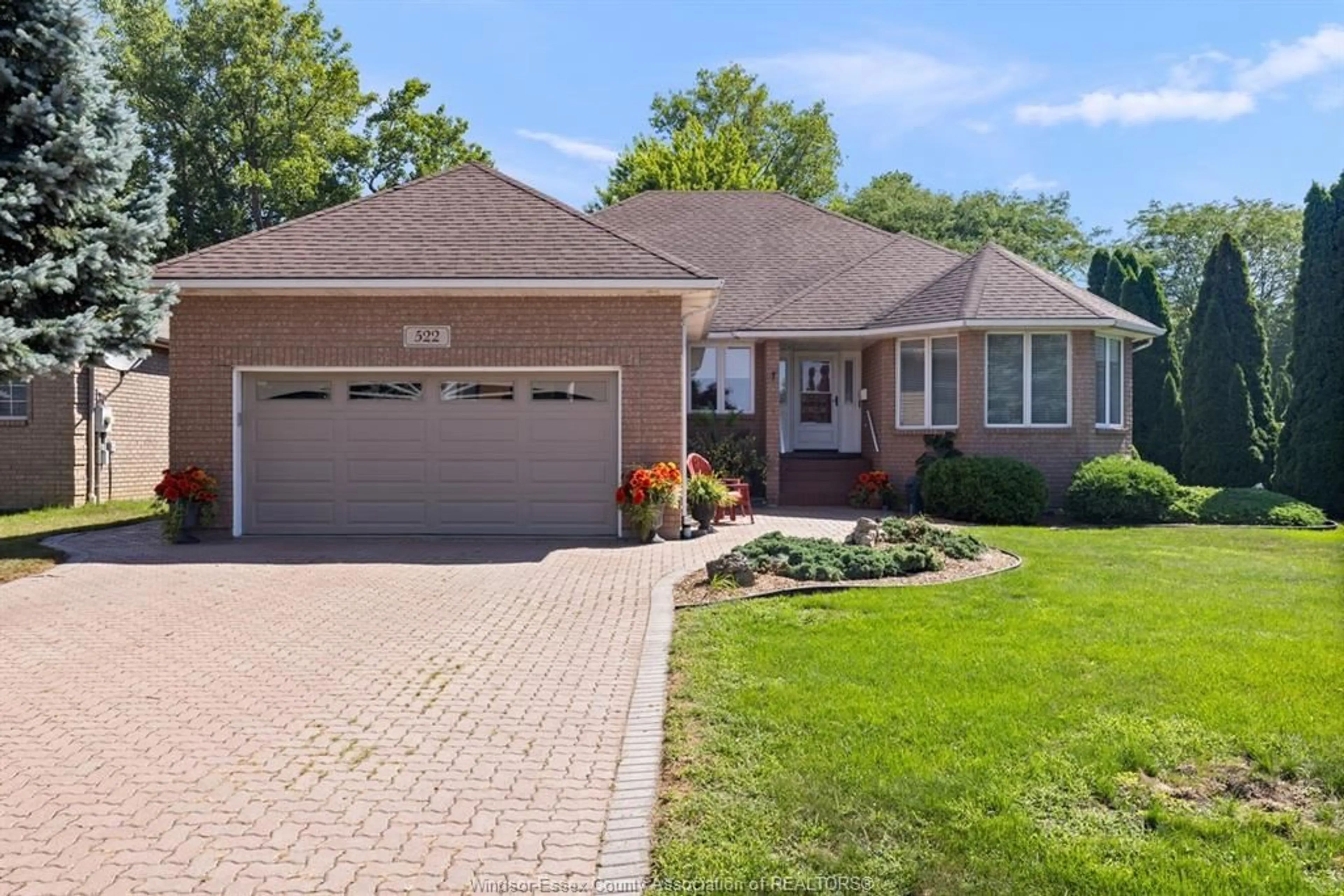 Home with brick exterior material, street for 522 BREEZEWOOD St, Windsor Ontario N8P 1H4