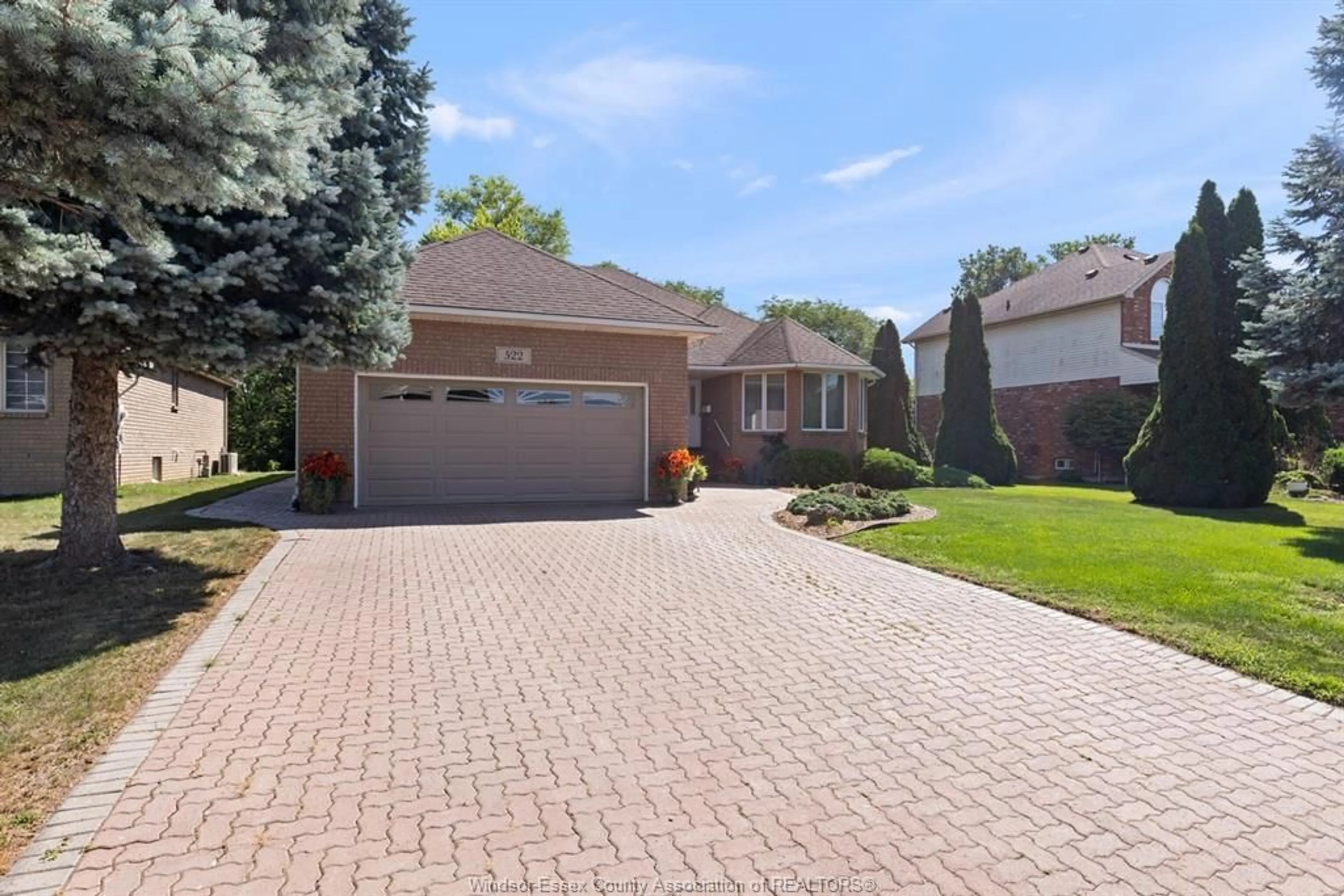 Home with brick exterior material, street for 522 BREEZEWOOD St, Windsor Ontario N8P 1H4