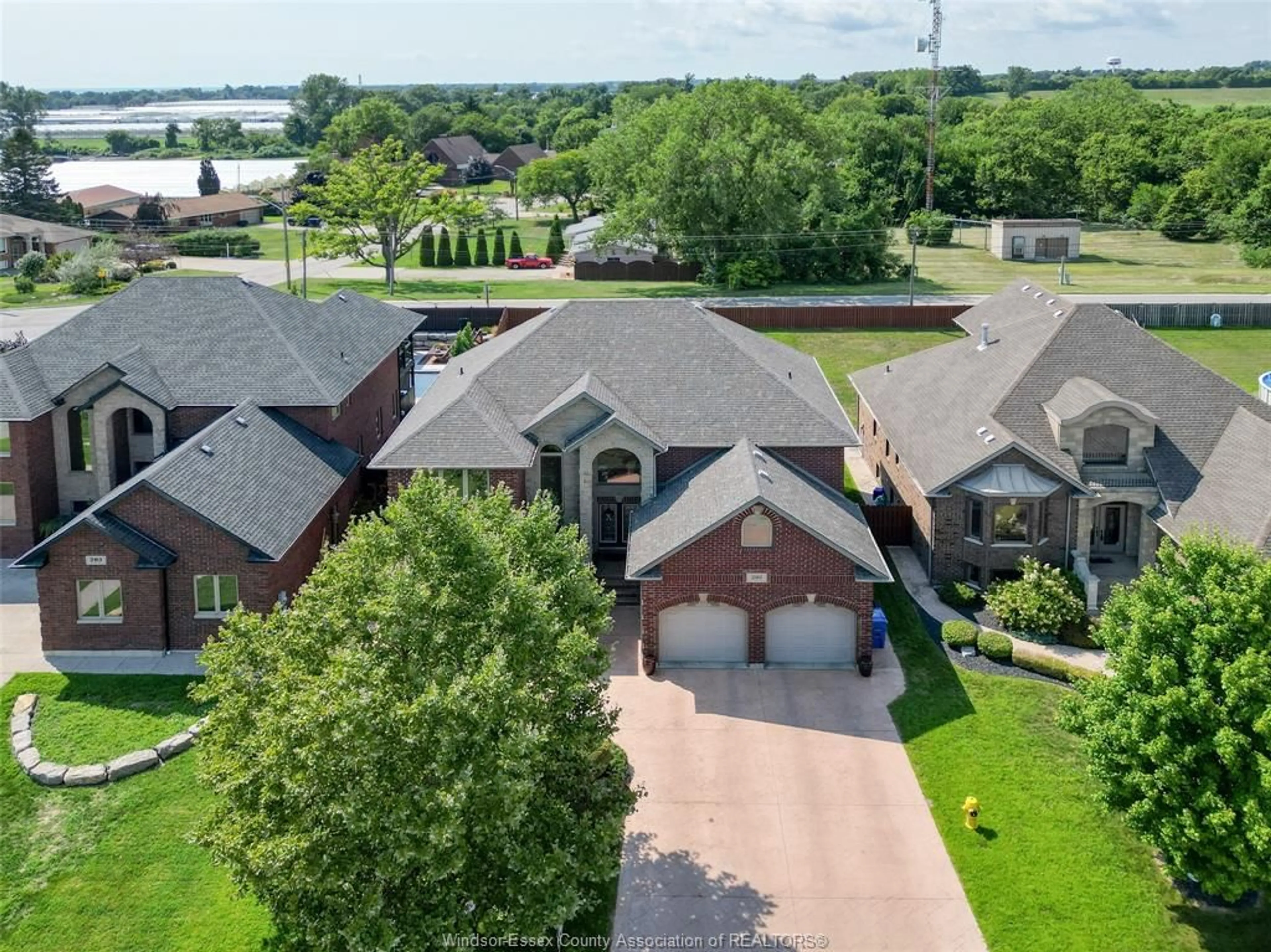 A pic from outside/outdoor area/front of a property/back of a property/a pic from drone, water/lake/river/ocean view for 201 ELLISON, Leamington Ontario N8H 5J2