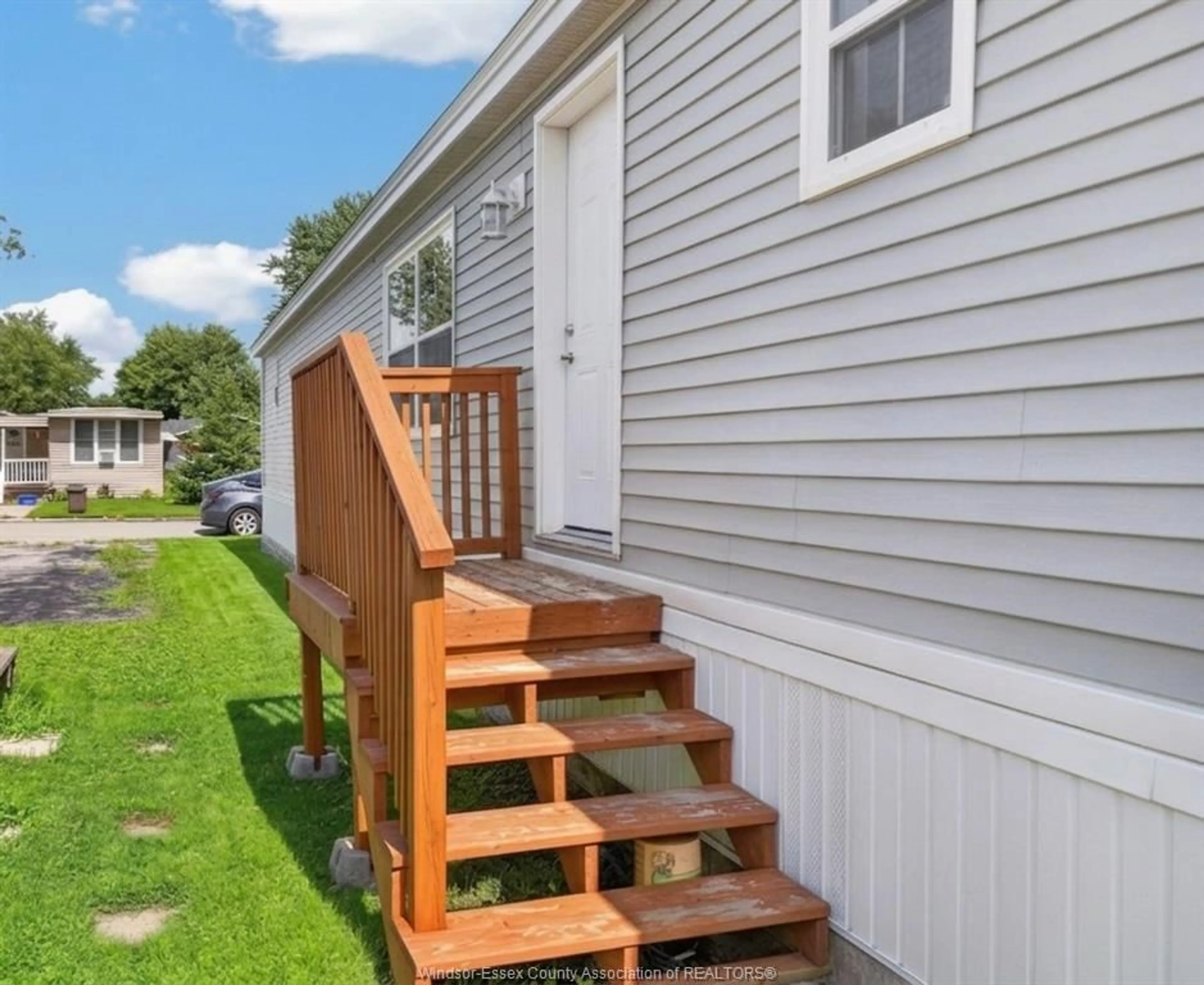 Home with vinyl exterior material, street for 122 STEVEN Crt, Essex Ontario N8M 1Z9