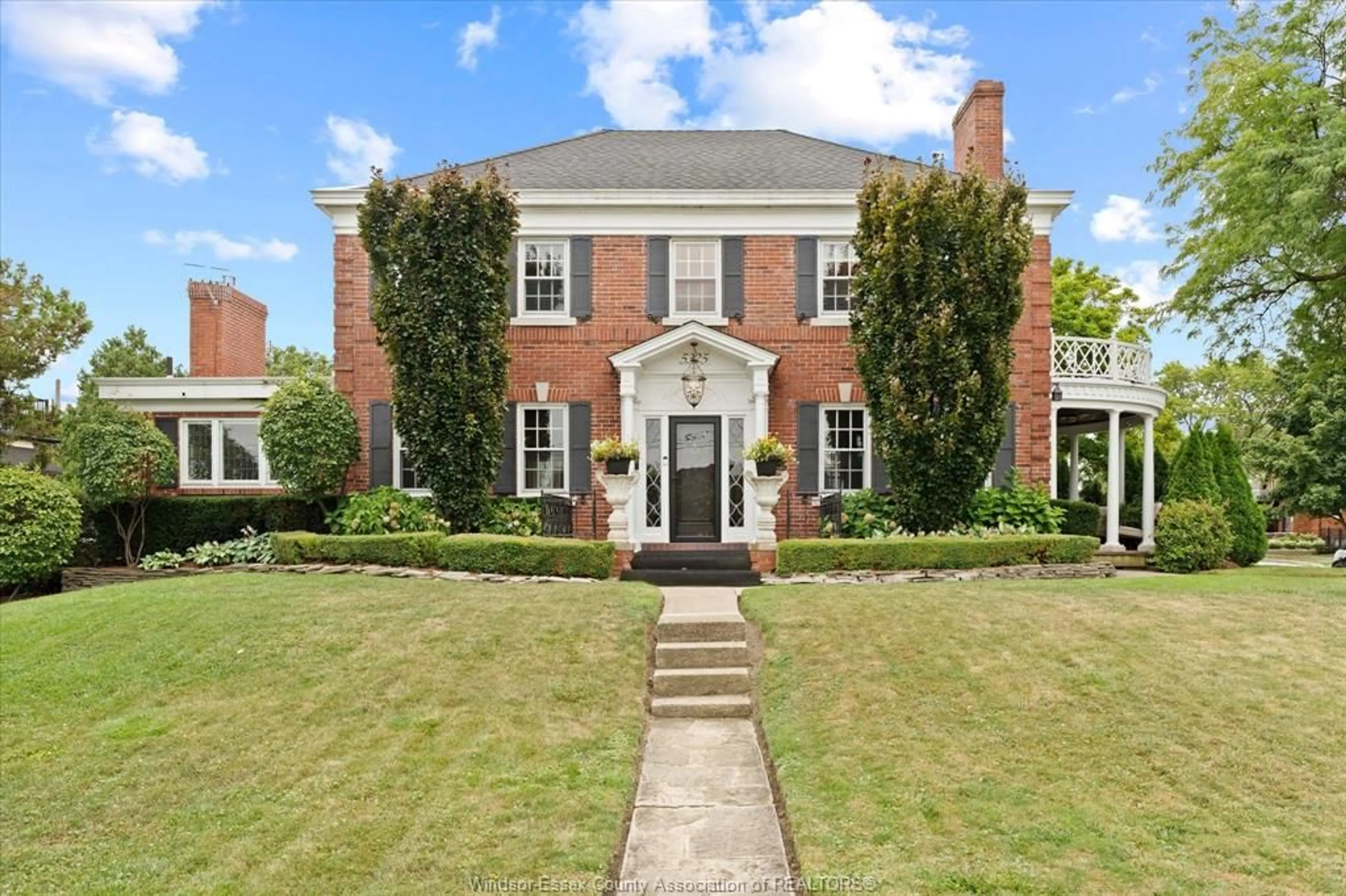 Home with brick exterior material, street for 5325 RIVERSIDE Dr, Windsor Ontario N8S 1A3