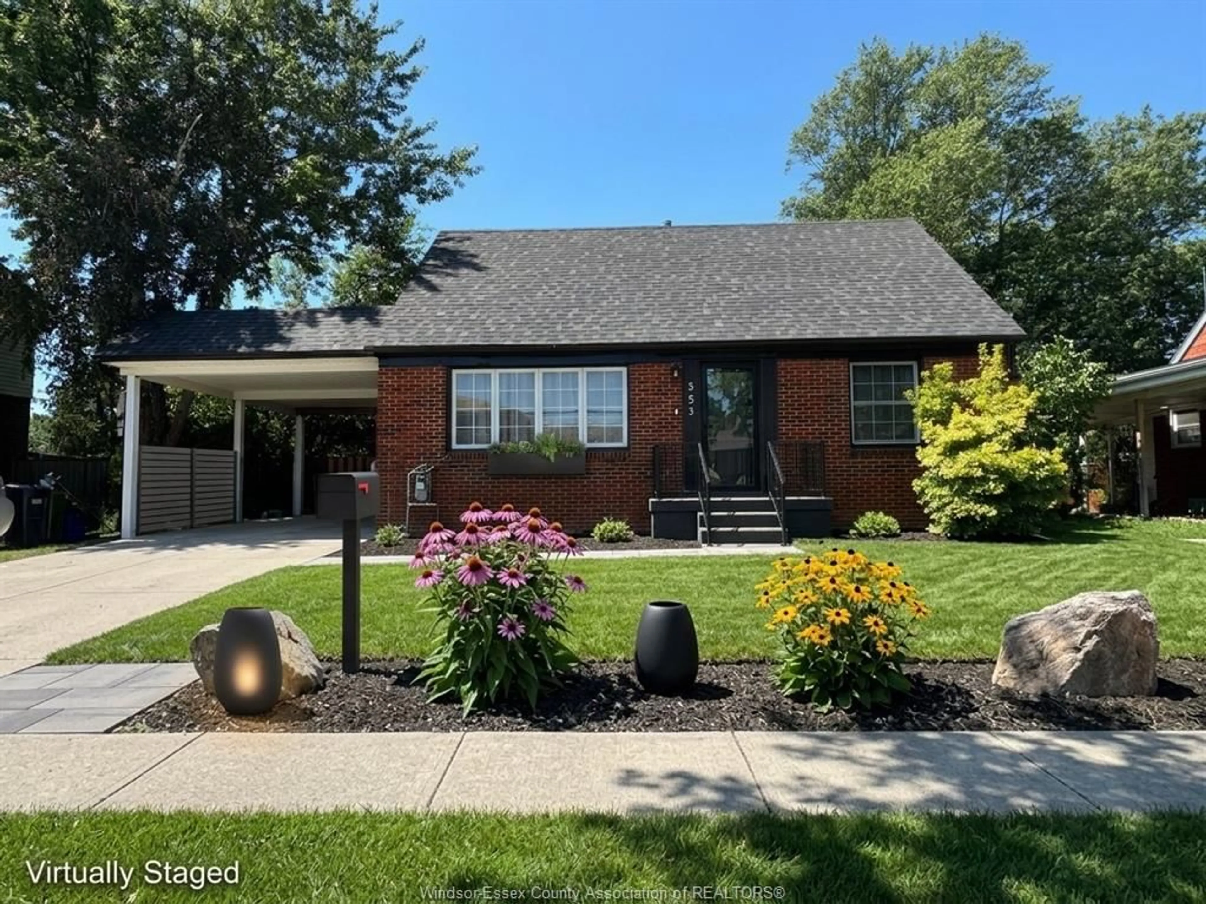 Home with brick exterior material, street for 353 LAUZON Rd, Windsor Ontario N8S 3M1