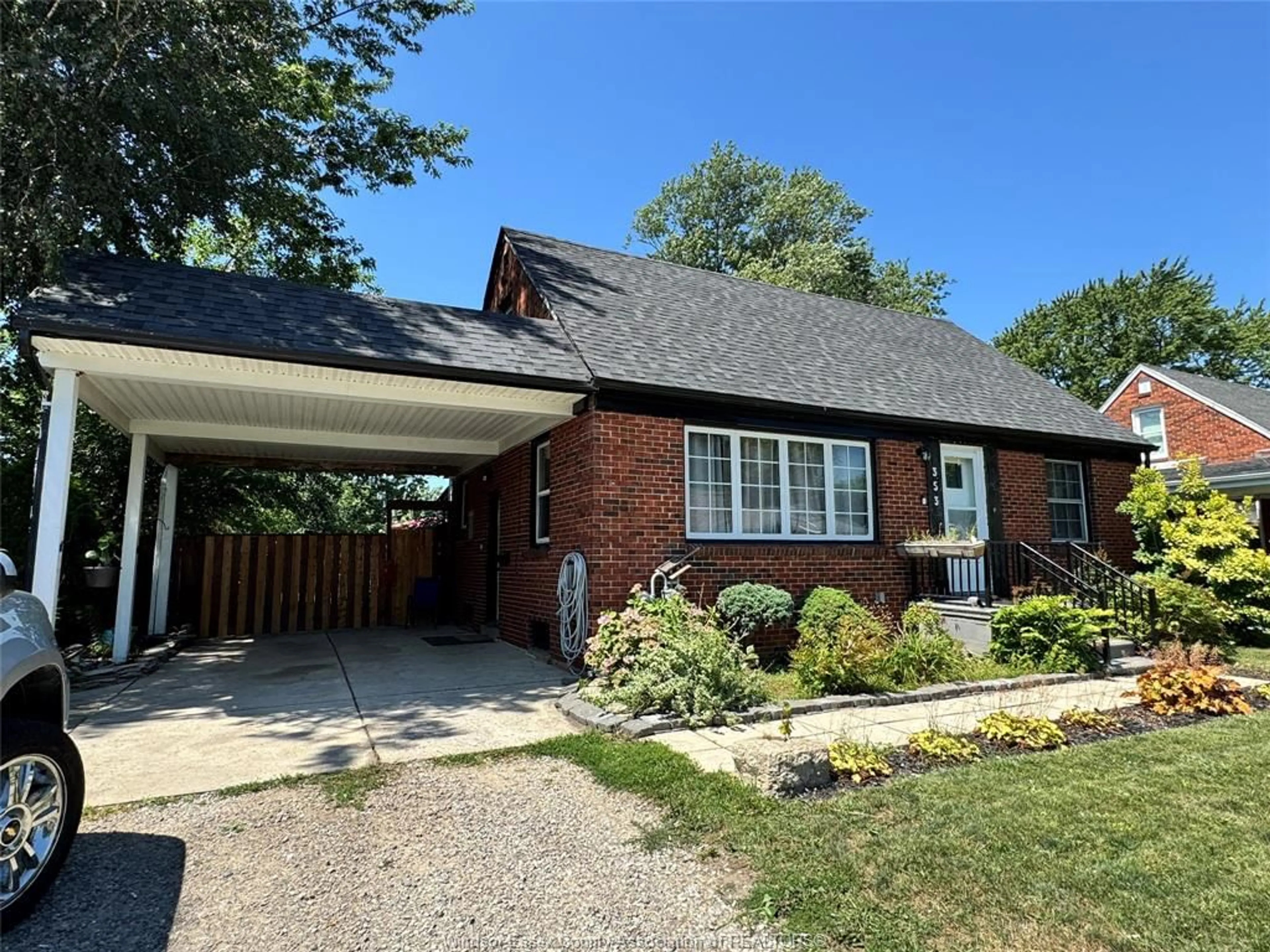 Home with brick exterior material, street for 353 LAUZON Rd, Windsor Ontario N8S 3M1