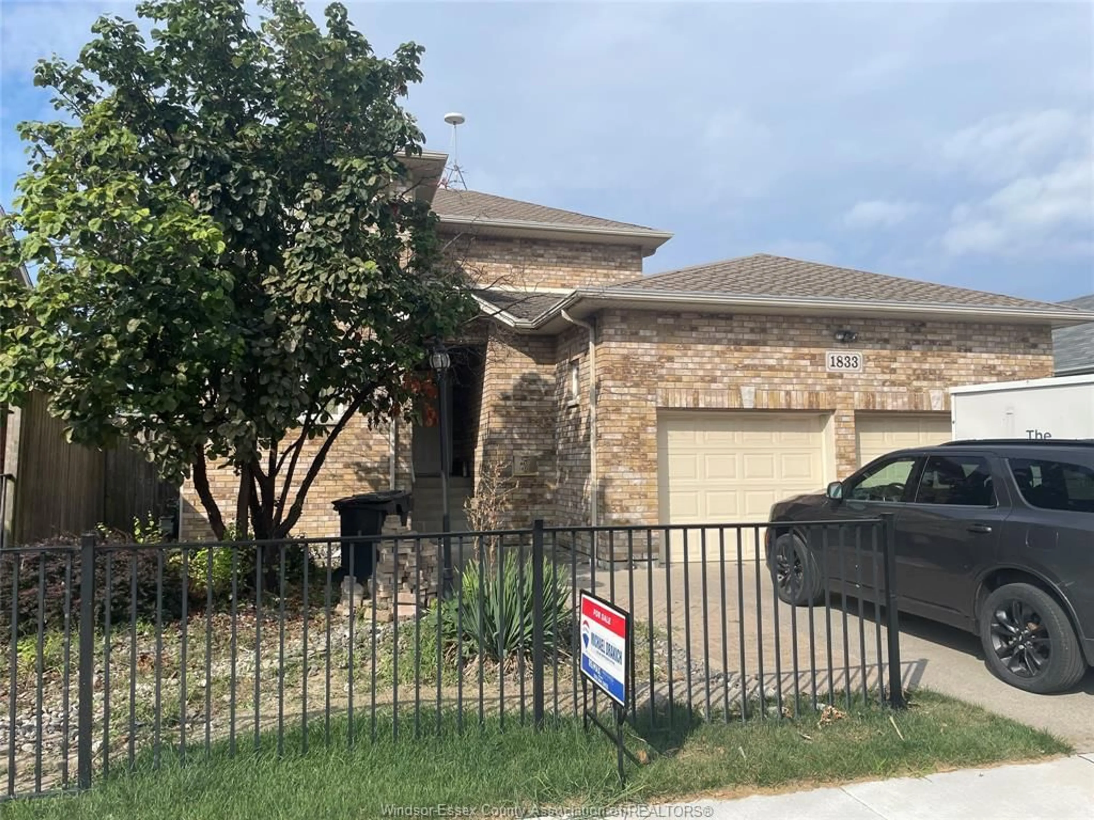 Home with brick exterior material, street for 1833 ST . LUKE Rd, Windsor Ontario N8W 3W8
