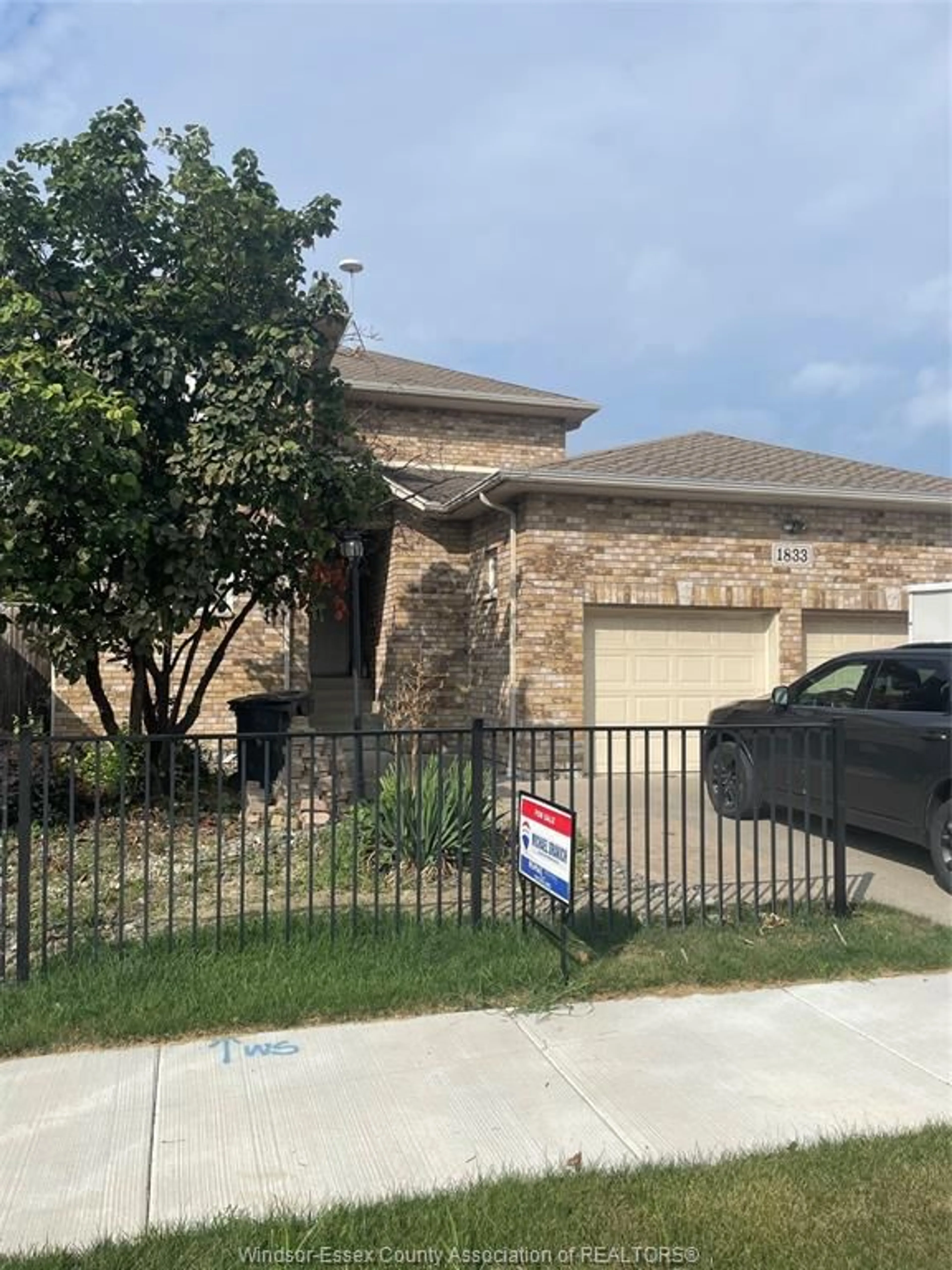 Home with brick exterior material, street for 1833 ST . LUKE Rd, Windsor Ontario N8W 3W8