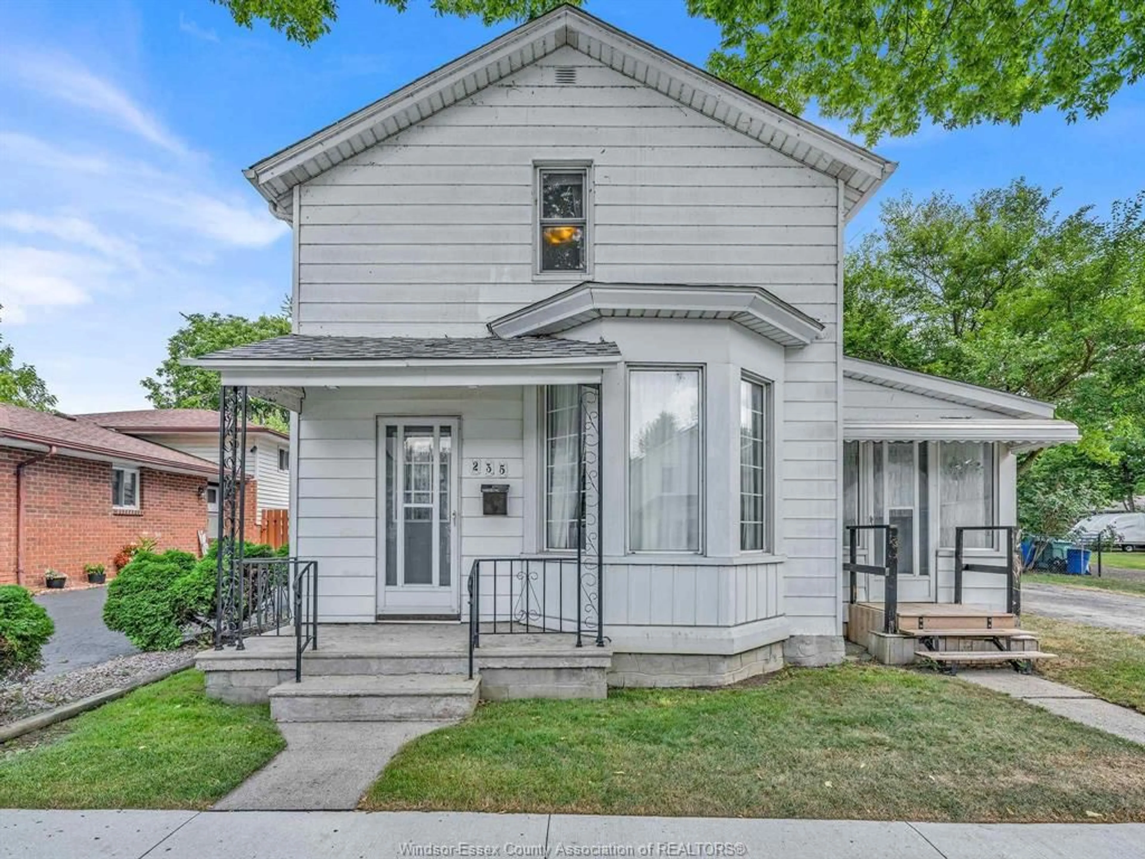Home with vinyl exterior material, street for 235 George St, Amherstburg Ontario N9V 2E8