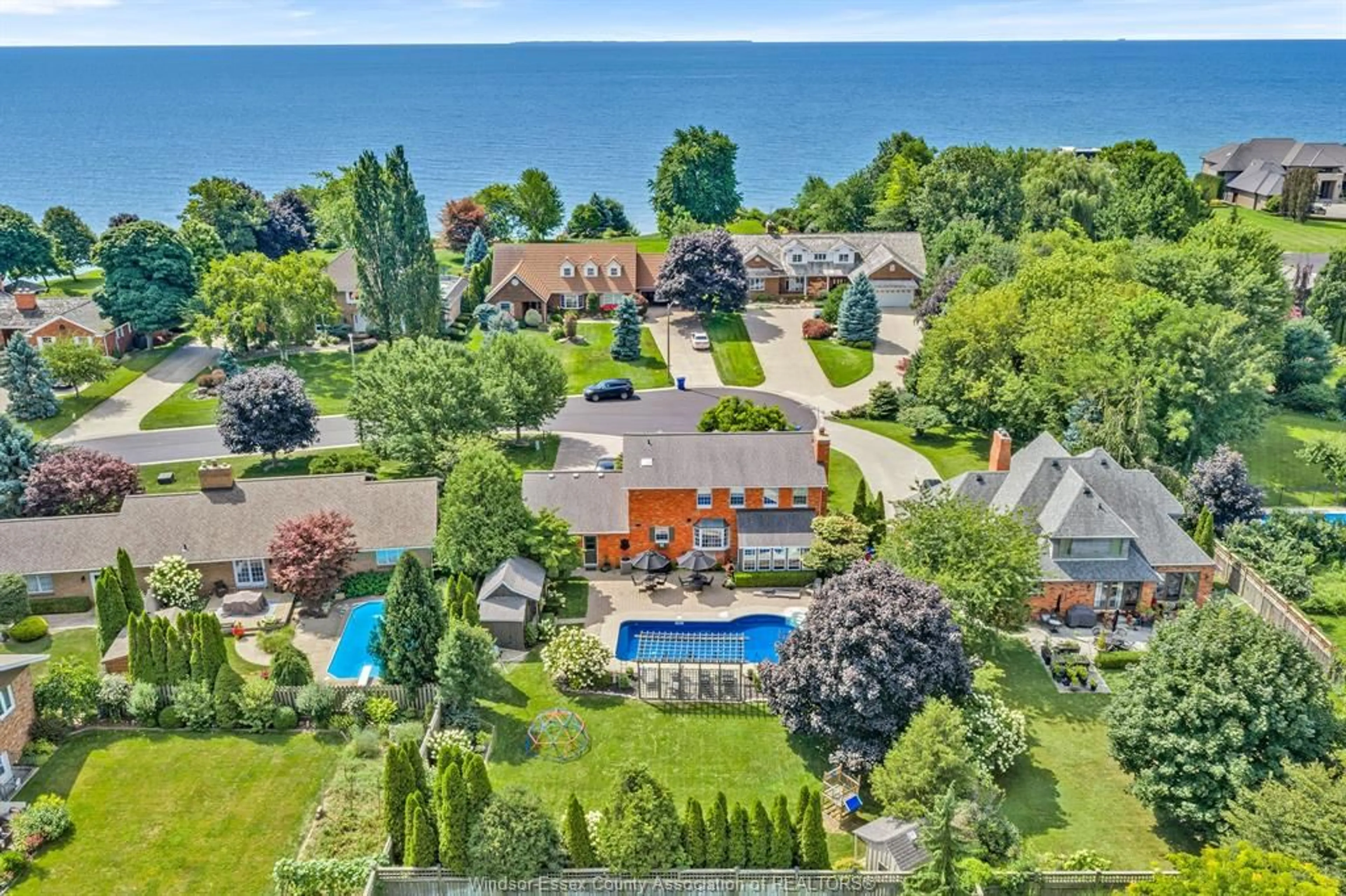 A pic from outside/outdoor area/front of a property/back of a property/a pic from drone, water/lake/river/ocean view for 2998 ST LUKE Cres, Kingsville Ontario N9Y 3N7