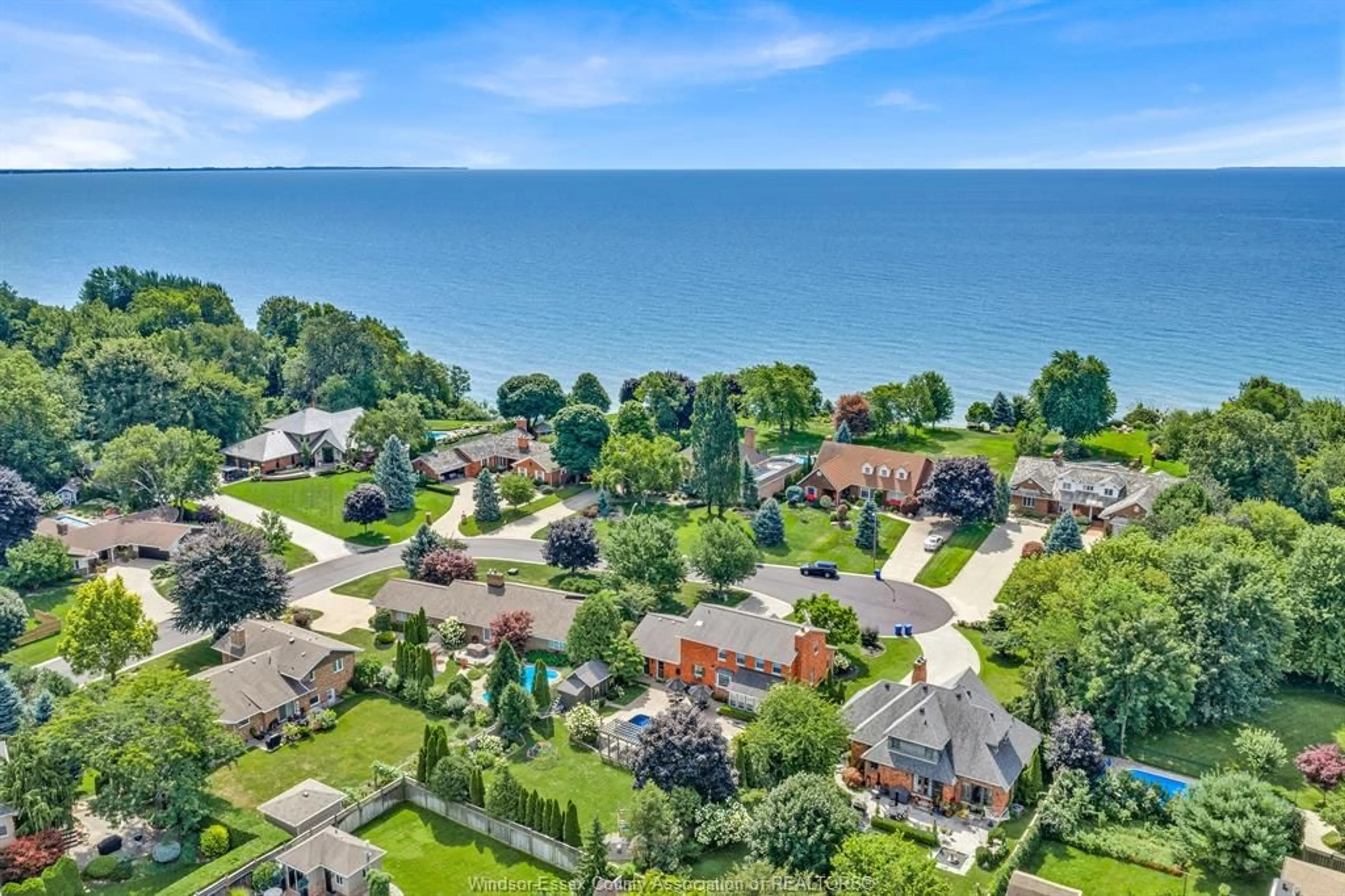A pic from outside/outdoor area/front of a property/back of a property/a pic from drone, water/lake/river/ocean view for 2998 ST LUKE Cres, Kingsville Ontario N9Y 3N7