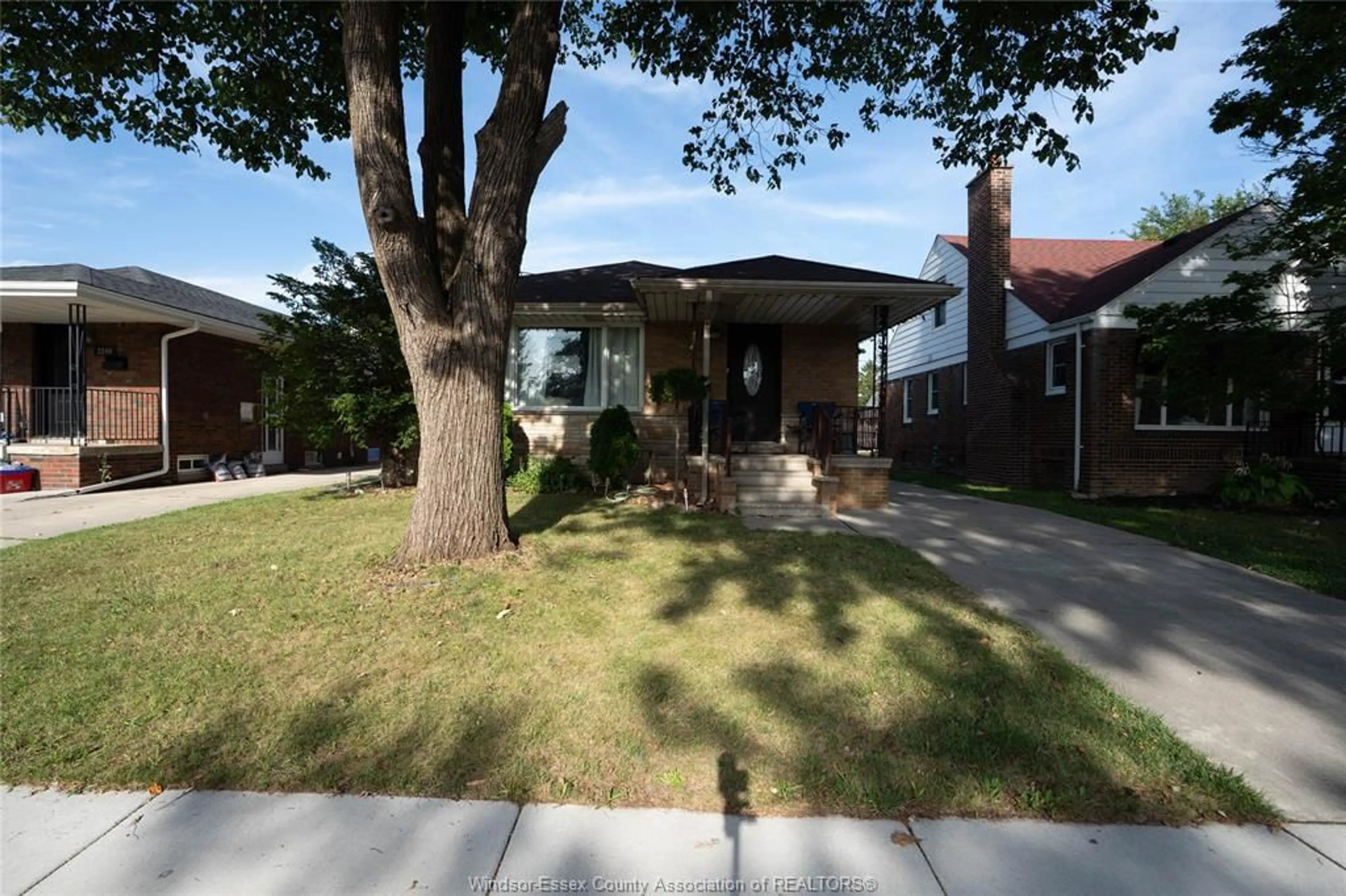 Home with brick exterior material, street for 2250 Woodlawn Ave, Windsor Ontario N8W 2H3