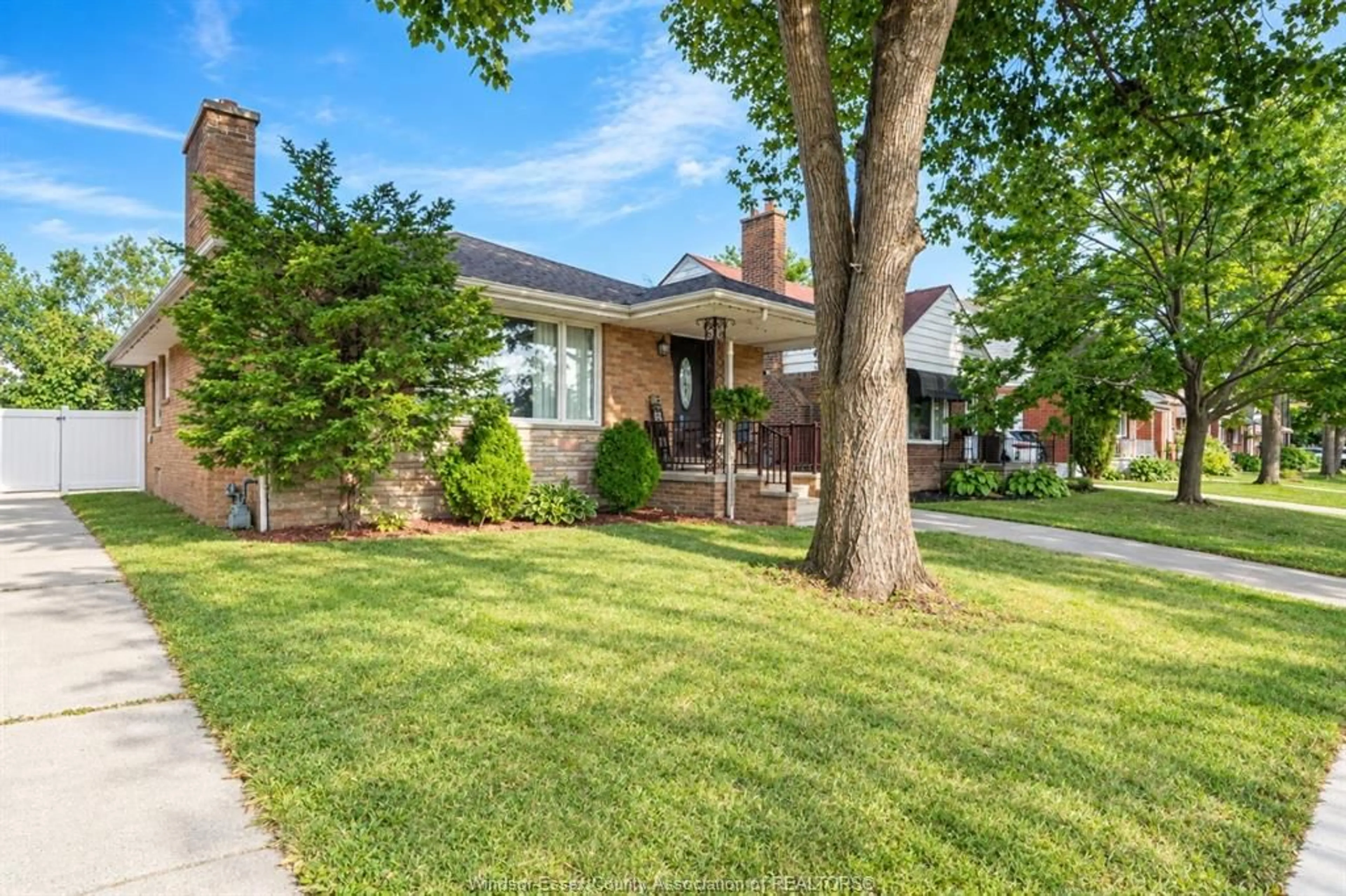 Home with brick exterior material, street for 2250 Woodlawn Ave, Windsor Ontario N8W 2H3