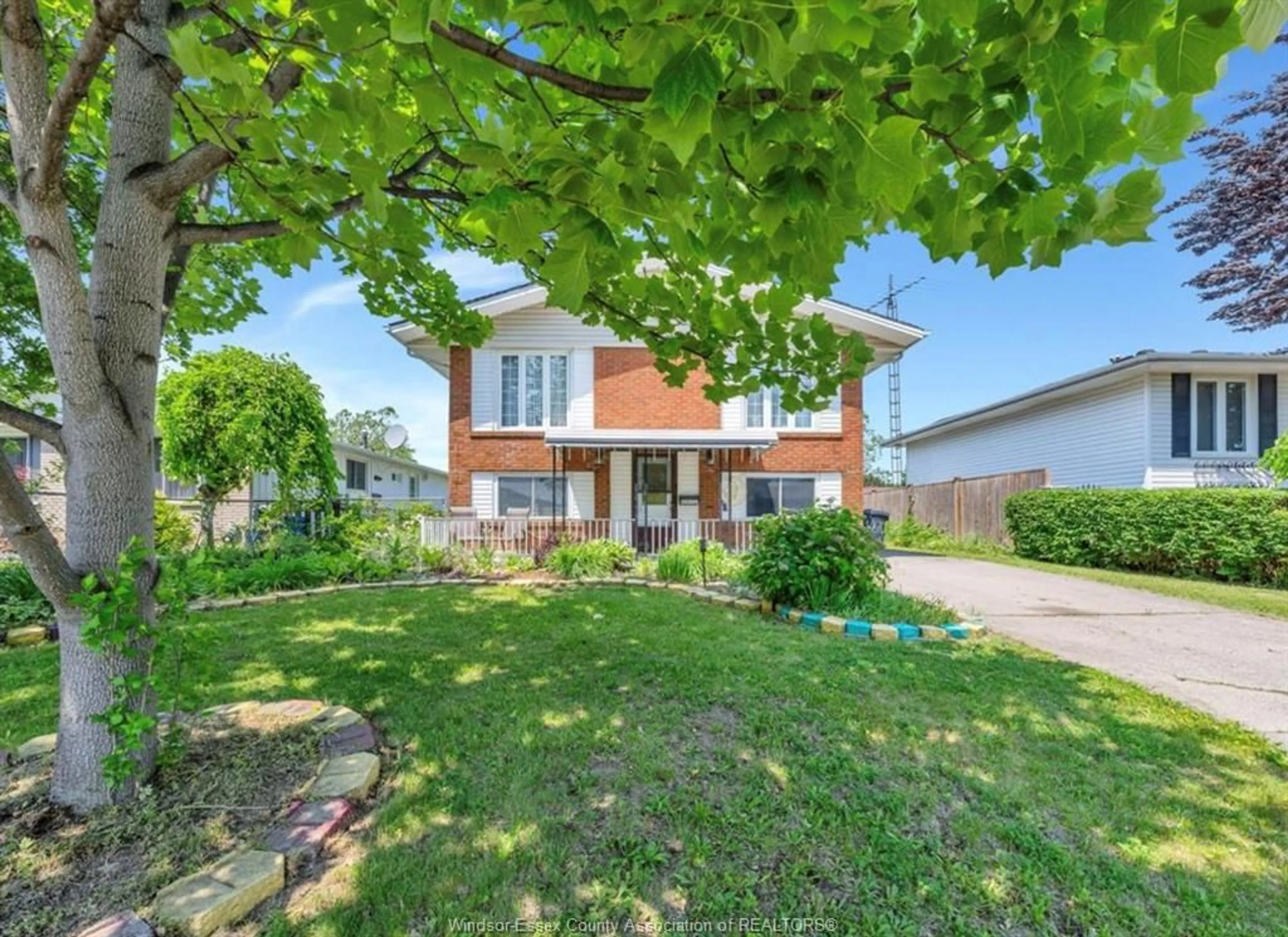 Home with brick exterior material, street for 10670 LAMBETH Rd, Windsor Ontario N8R 1C9