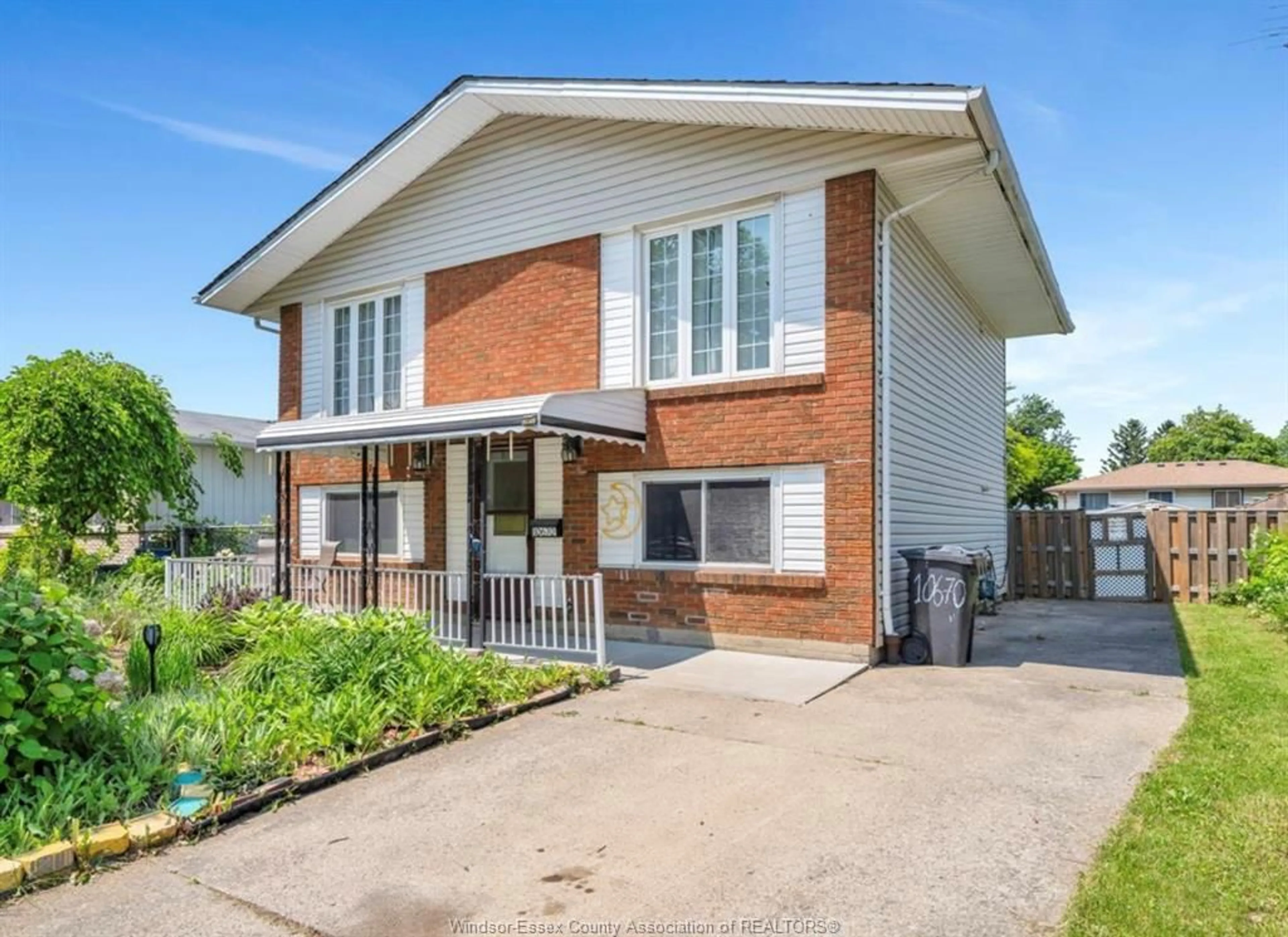 Home with brick exterior material, street for 10670 LAMBETH Rd, Windsor Ontario N8R 1C9