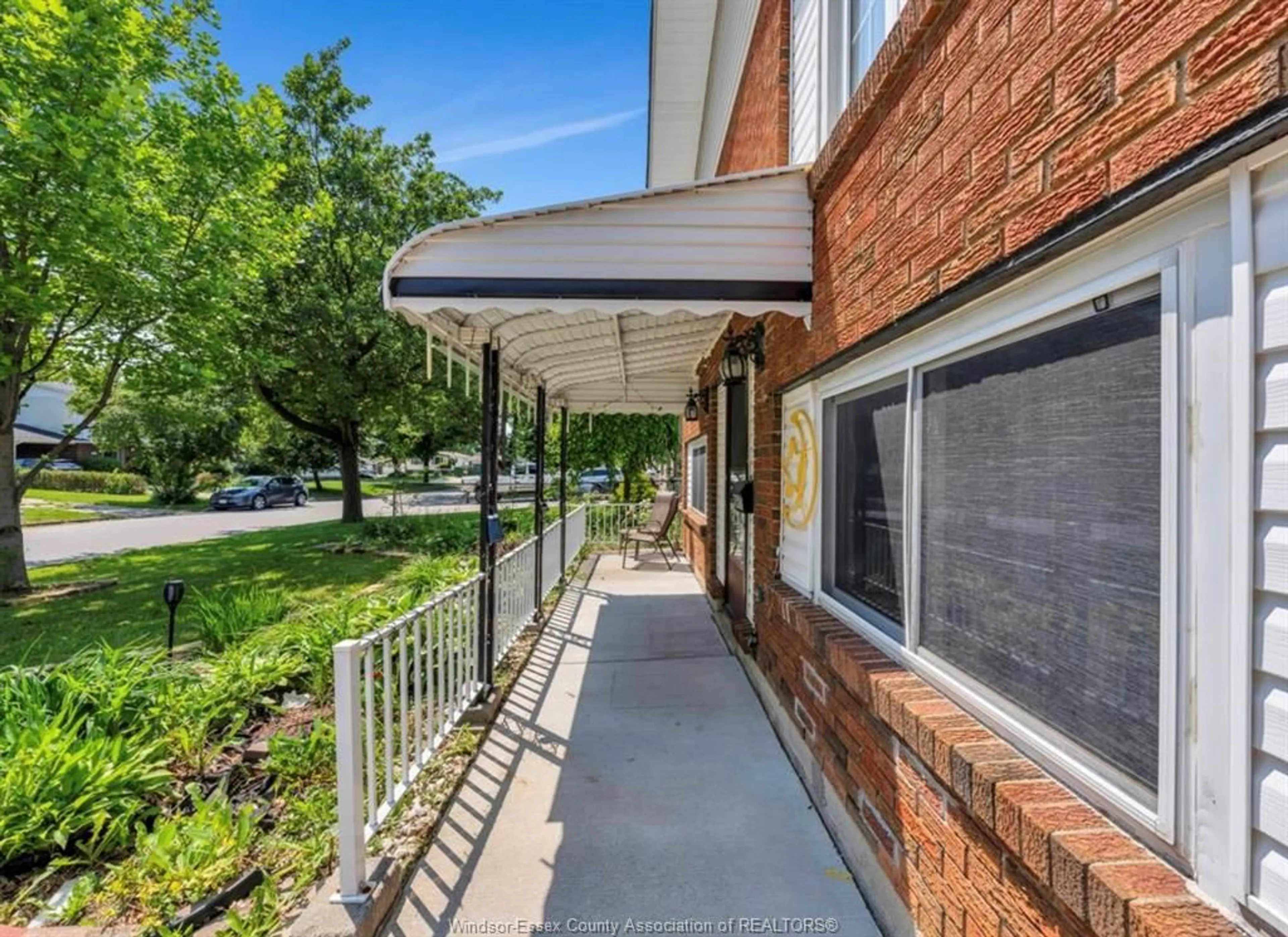 Home with brick exterior material, street for 10670 LAMBETH Rd, Windsor Ontario N8R 1C9