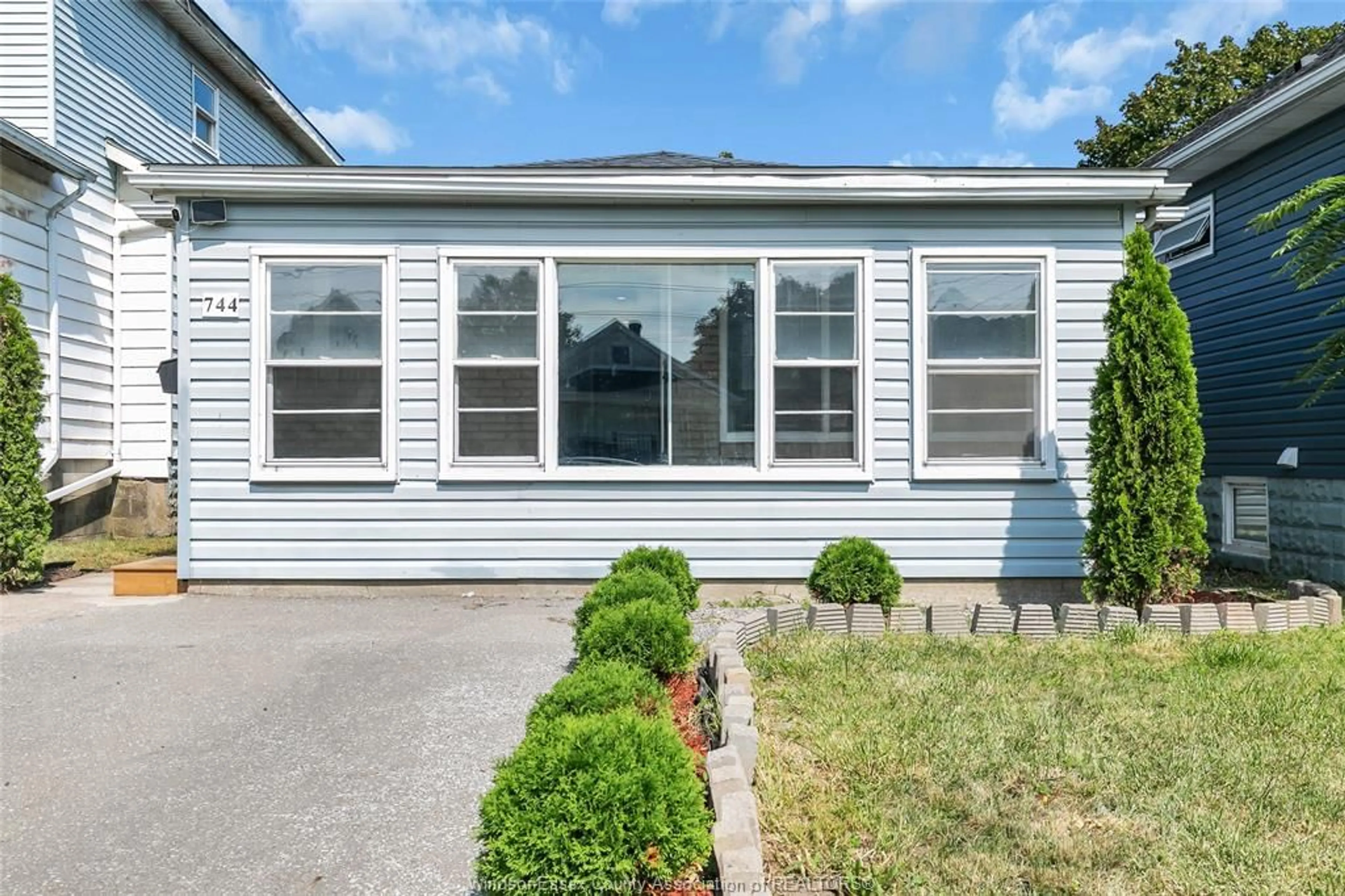 Home with vinyl exterior material, street for 744 MCKAY Ave, Windsor Ontario N9B 2A1