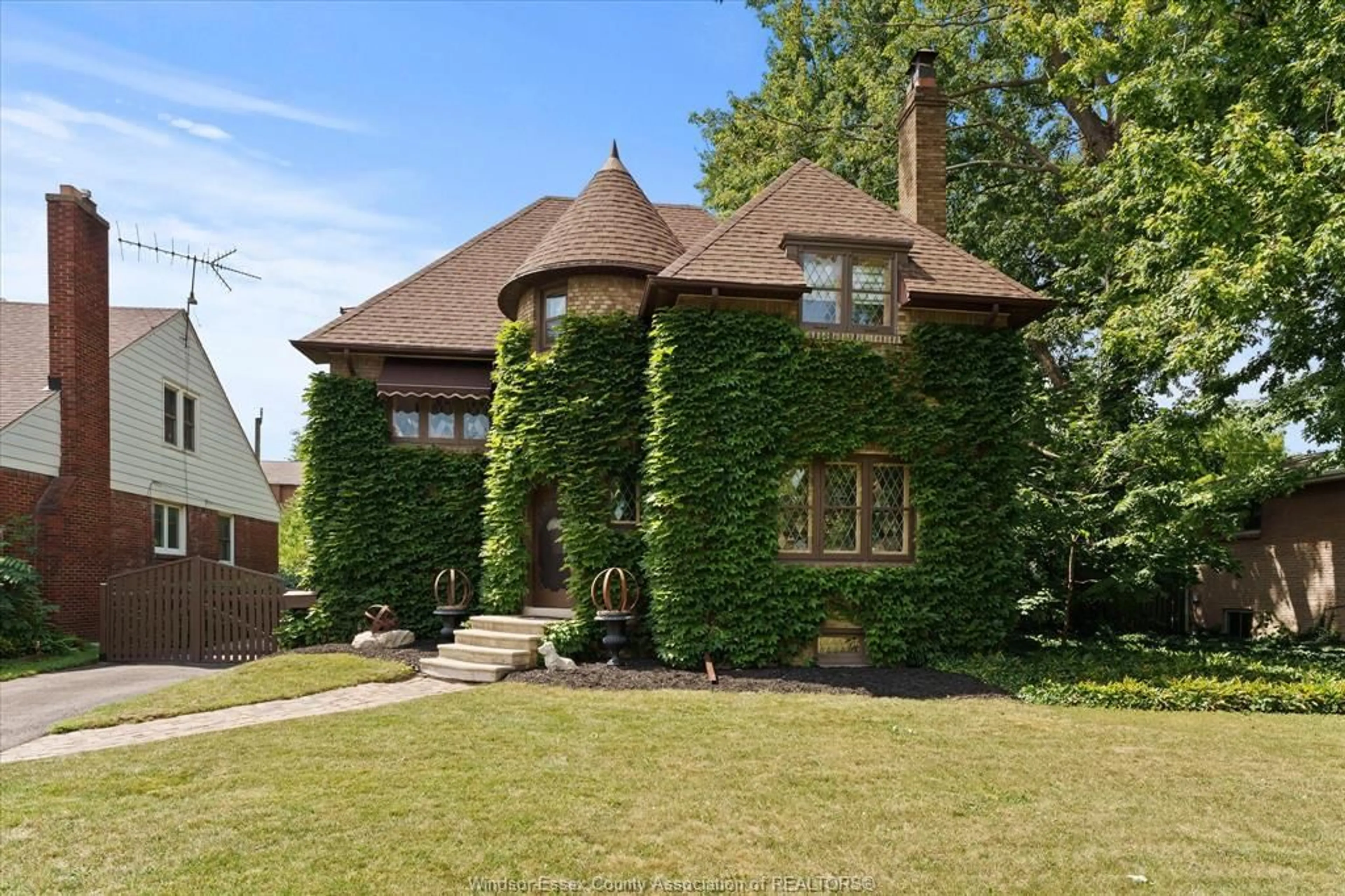 Home with brick exterior material, street for 1965 ROSSINI Blvd, Windsor Ontario N8N 4P6