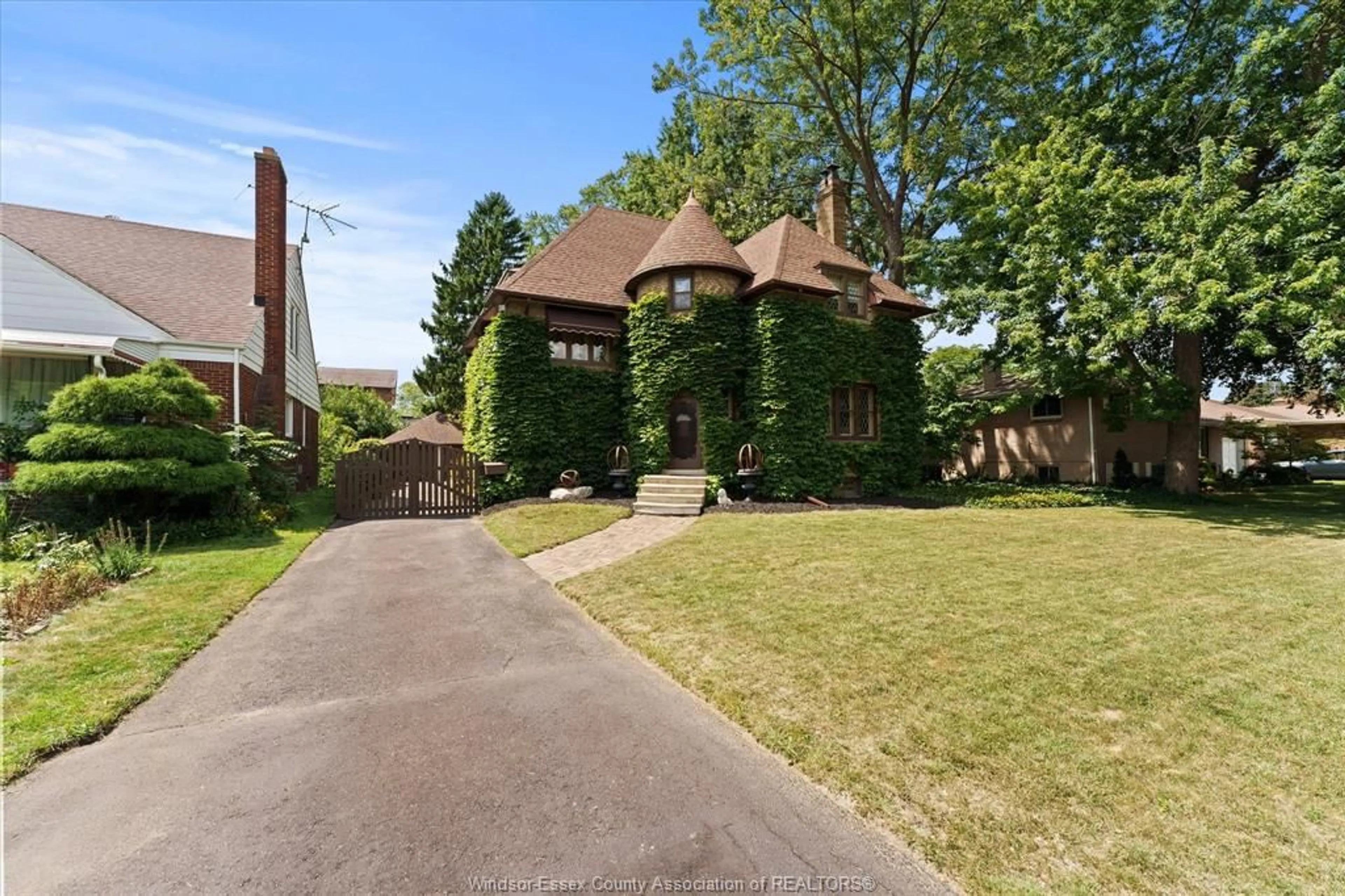 Home with brick exterior material, street for 1965 ROSSINI Blvd, Windsor Ontario N8N 4P6