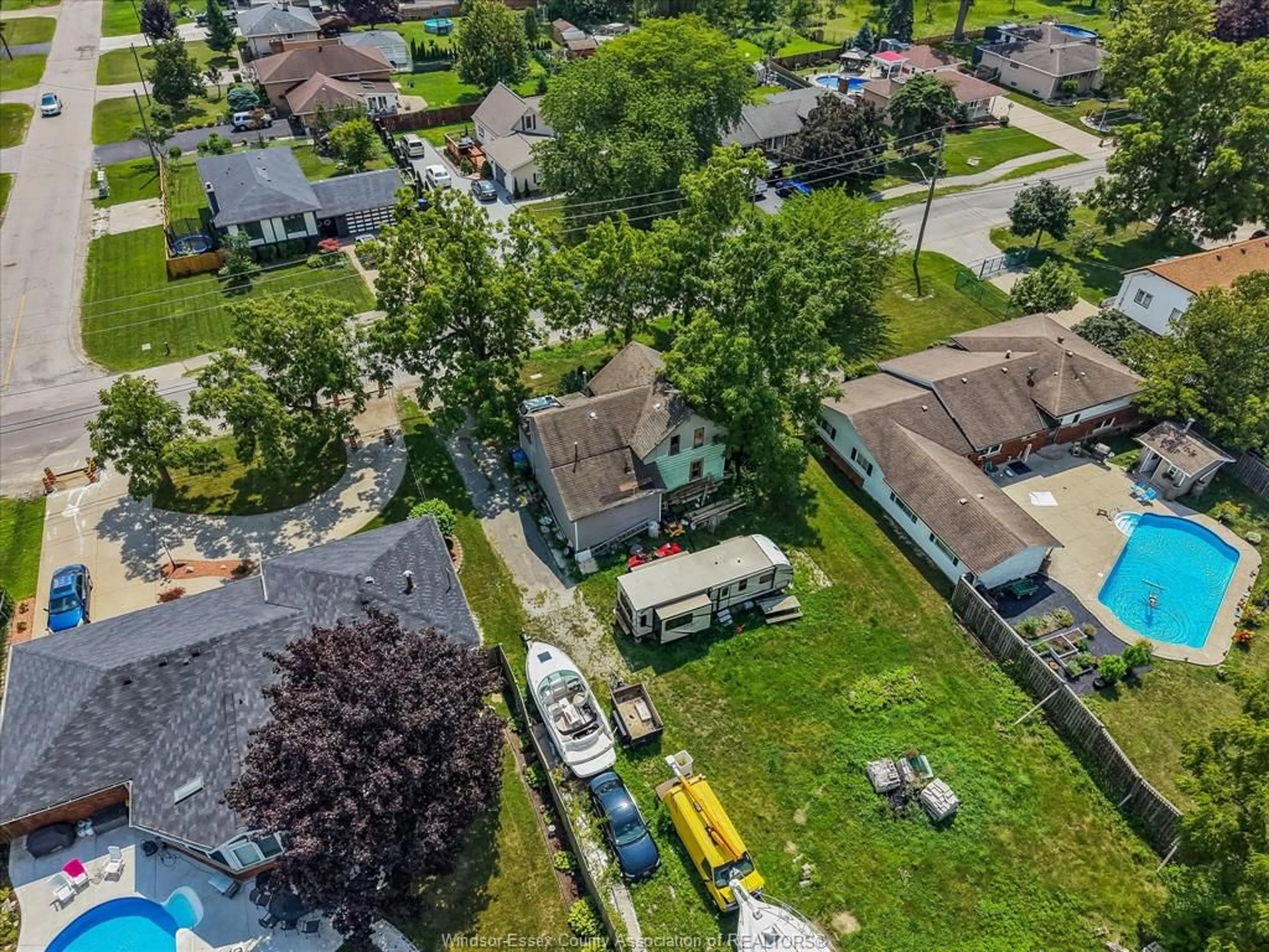 A pic from outside/outdoor area/front of a property/back of a property/a pic from drone, street for 12122 INTERSECTION Rd, Tecumseh Ontario N8N 1R3