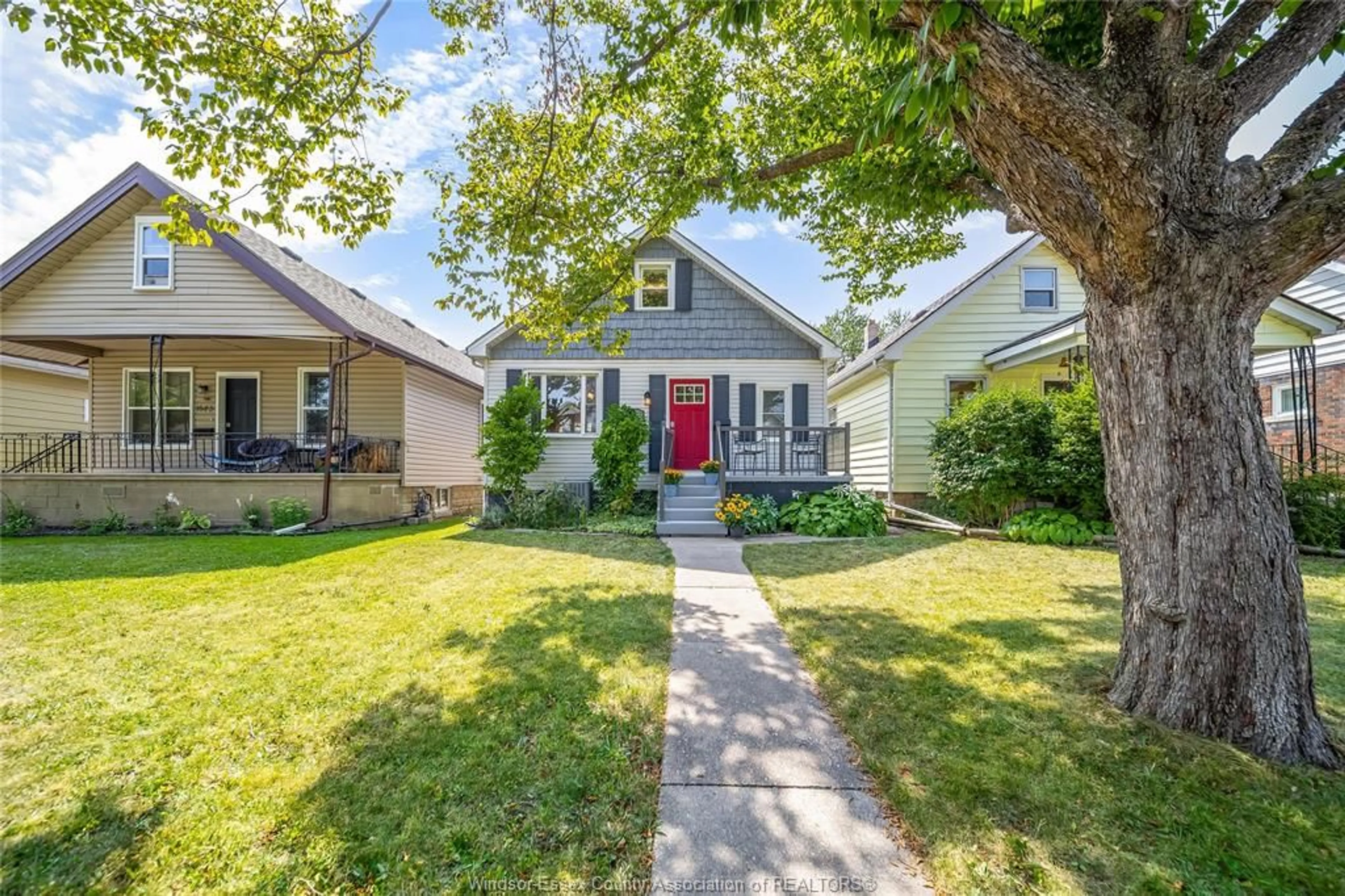 Home with vinyl exterior material, street for 1641 HALL Ave, Windsor Ontario N8X 4S2