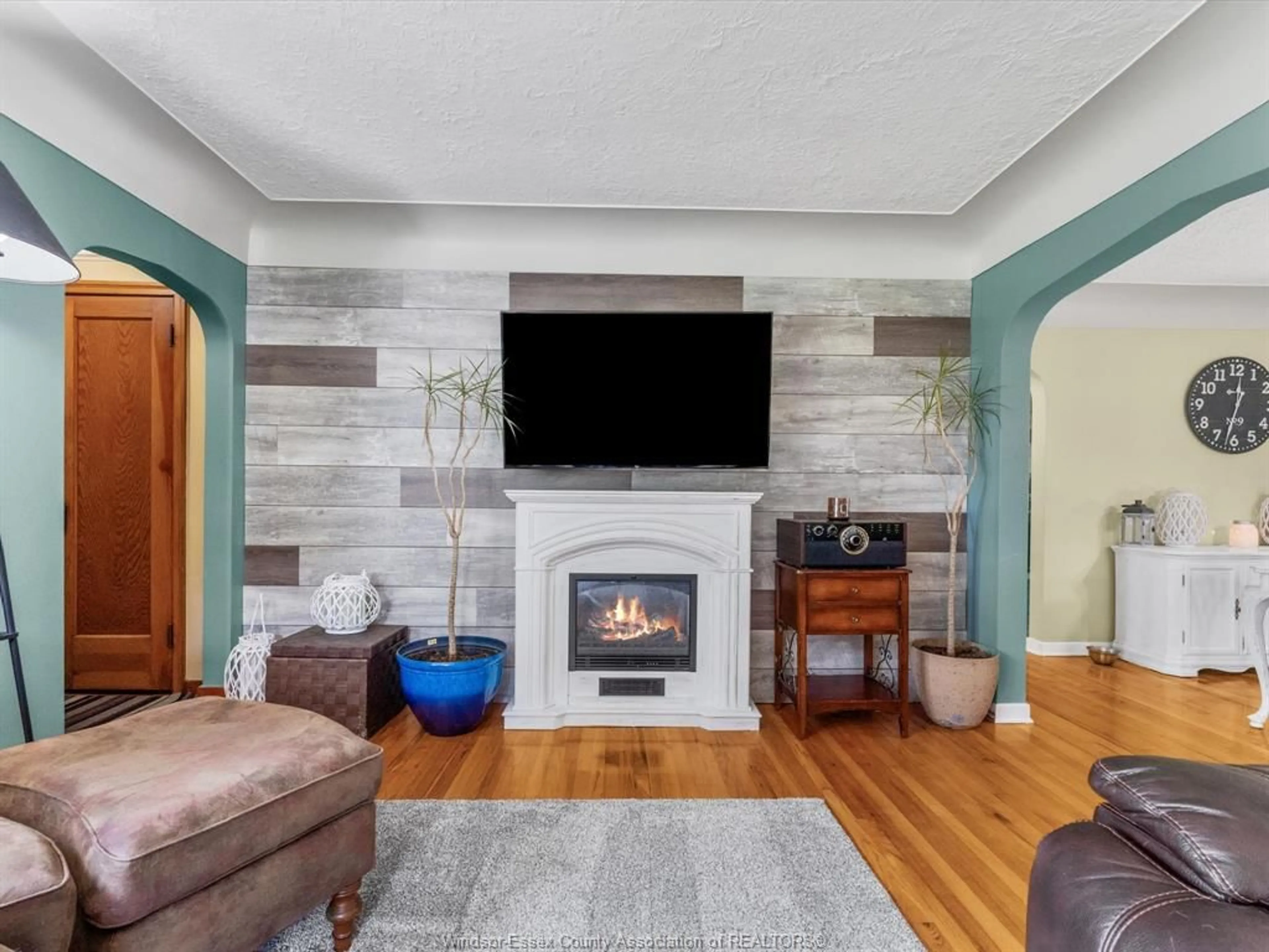 Living room with furniture, wood/laminate floor for 343 County Rd 14, Cottam Ontario N0R 1B0
