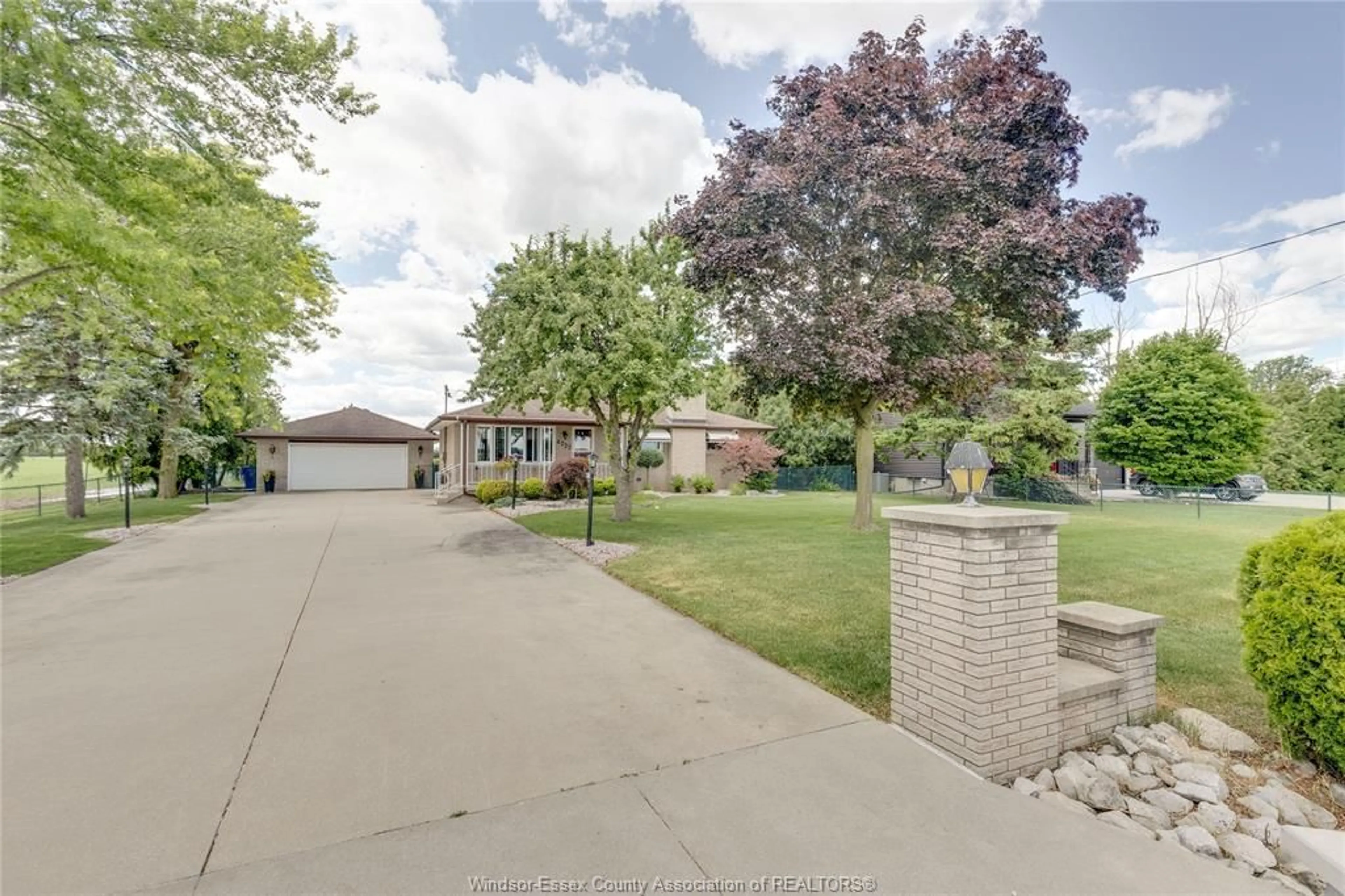 A pic from outside/outdoor area/front of a property/back of a property/a pic from drone, street for 4727 8TH CONCESSION Rd, Windsor Ontario N0R 1K0