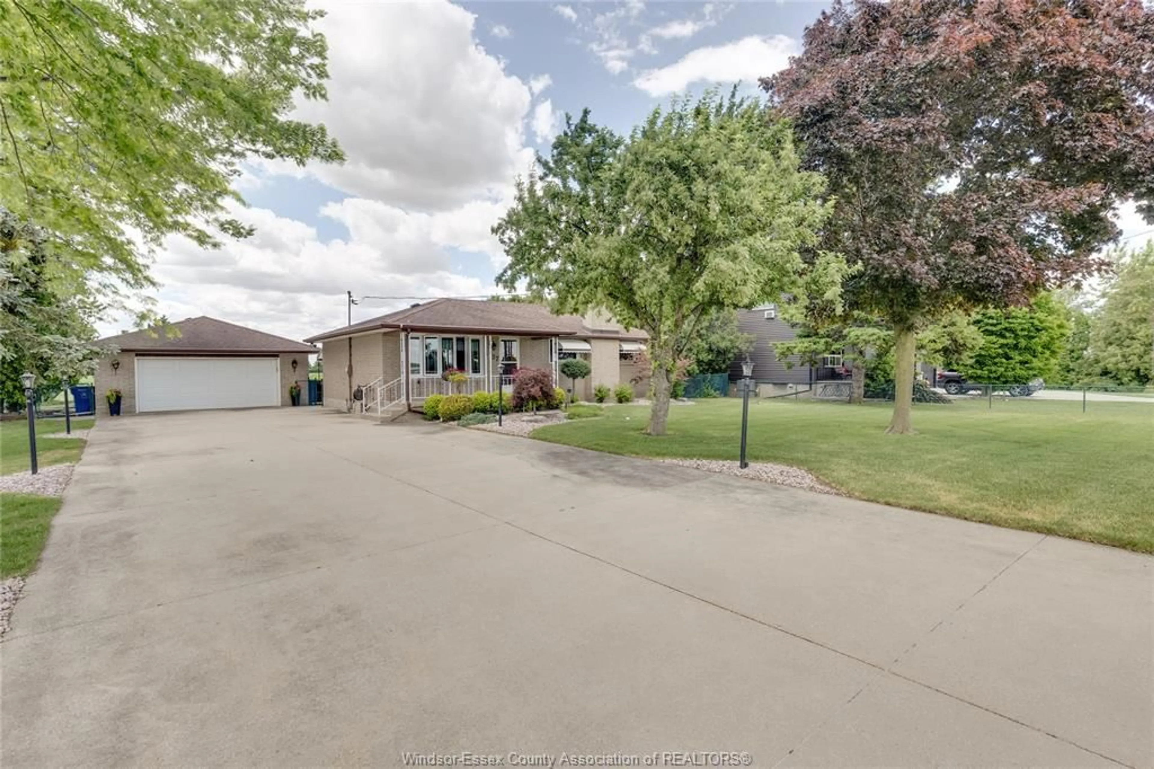 A pic from outside/outdoor area/front of a property/back of a property/a pic from drone, street for 4727 8TH CONCESSION Rd, Windsor Ontario N0R 1K0