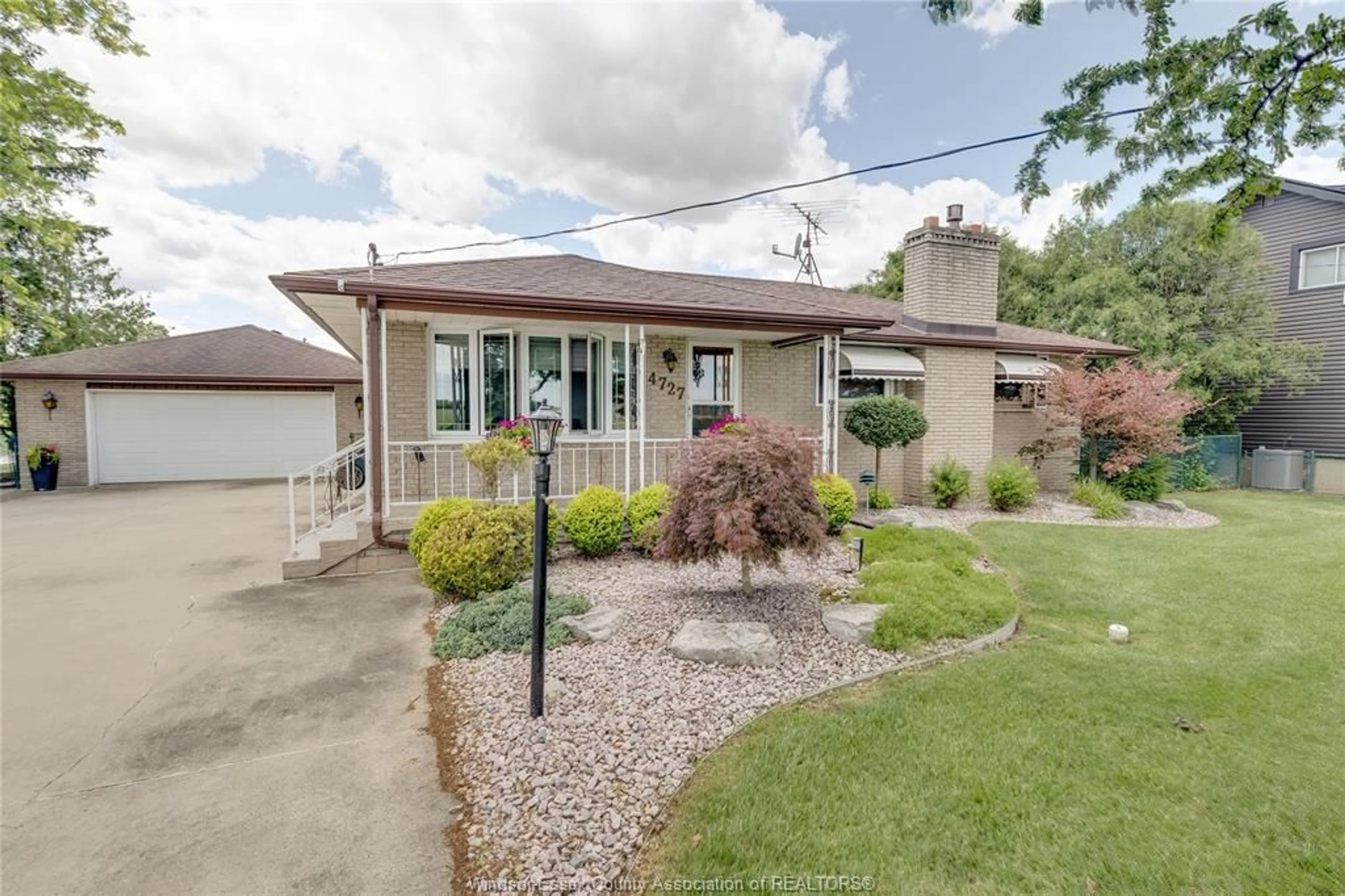 Home with brick exterior material, street for 4727 8TH CONCESSION Rd, Windsor Ontario N0R 1K0
