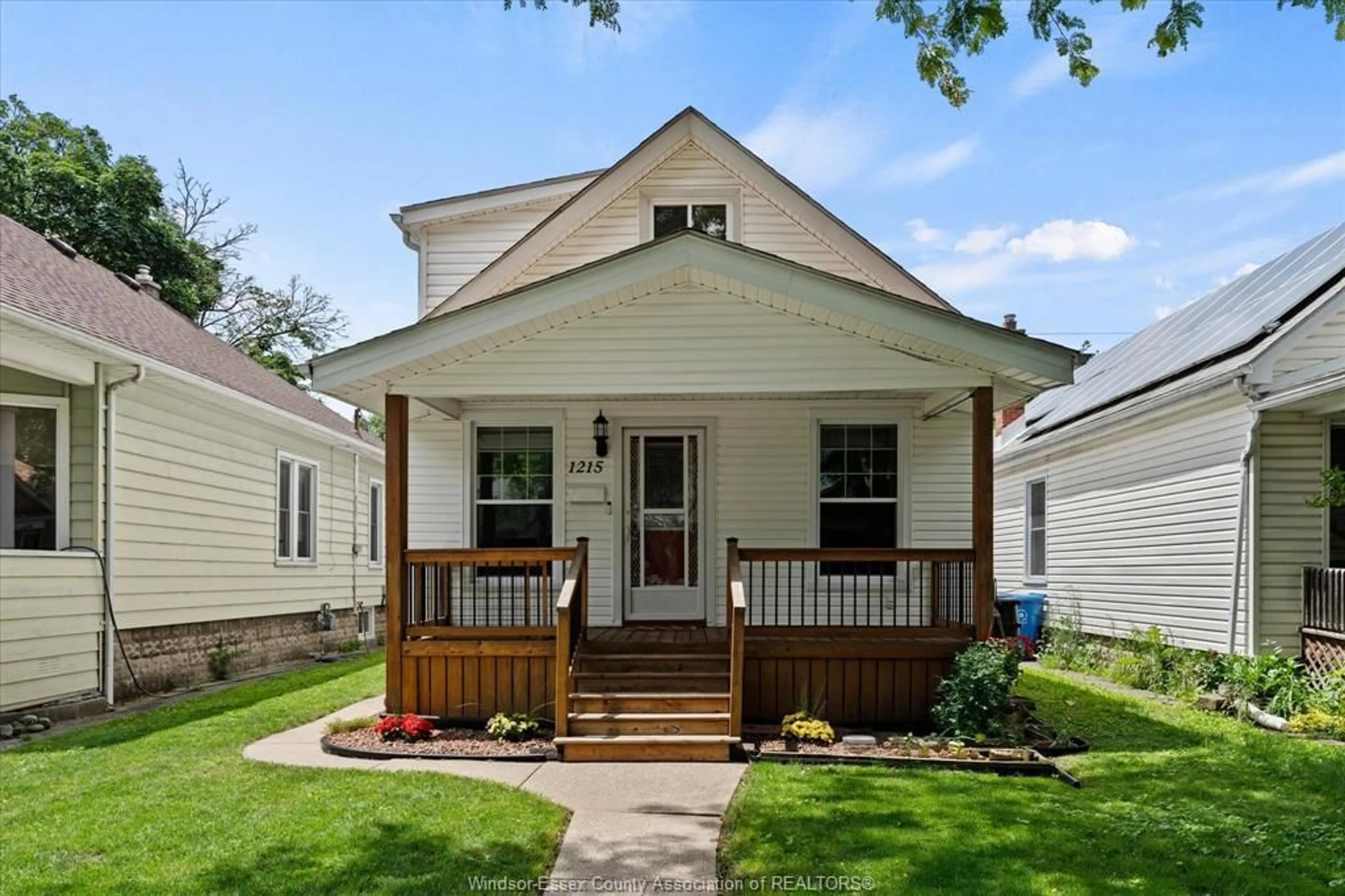 Home with vinyl exterior material, street for 1215 LINCOLN Rd, Windsor Ontario N8Y 2H9