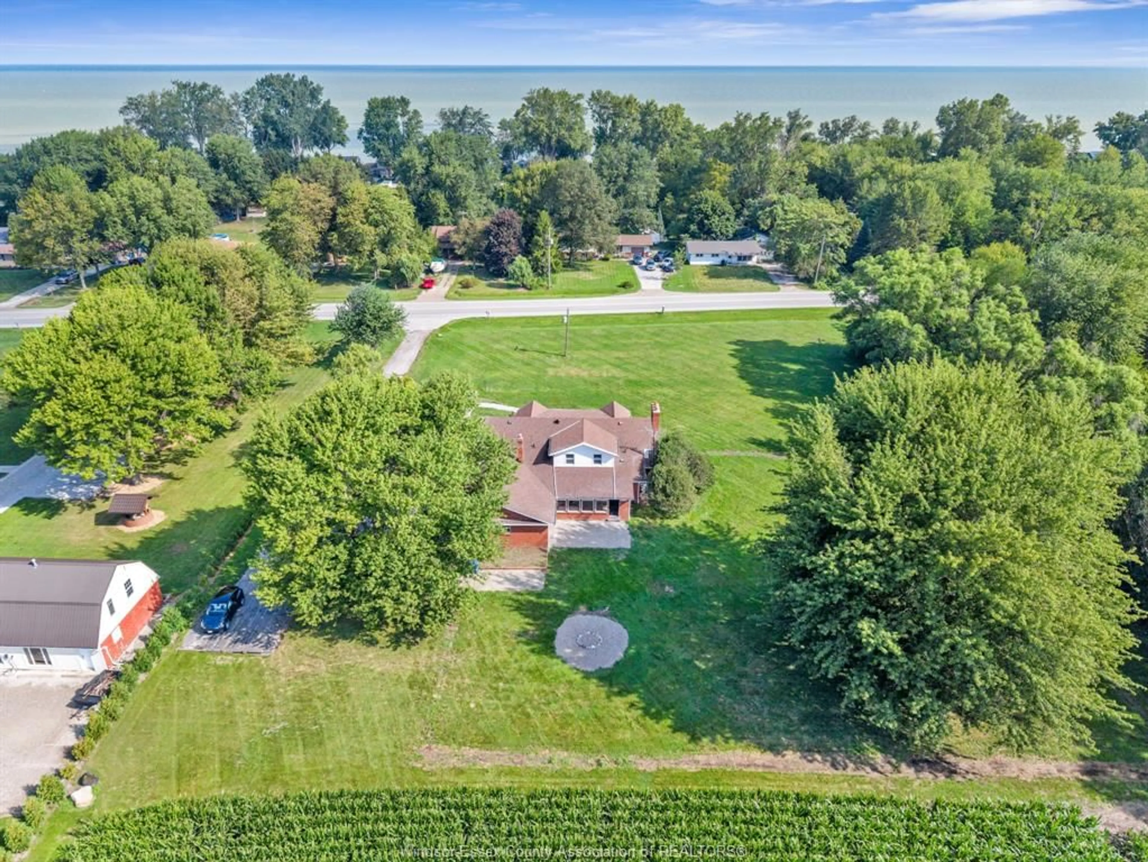 A pic from outside/outdoor area/front of a property/back of a property/a pic from drone, water/lake/river/ocean view for 620 COUNTY ROAD 2, Lakeshore Ontario N0R 1A0