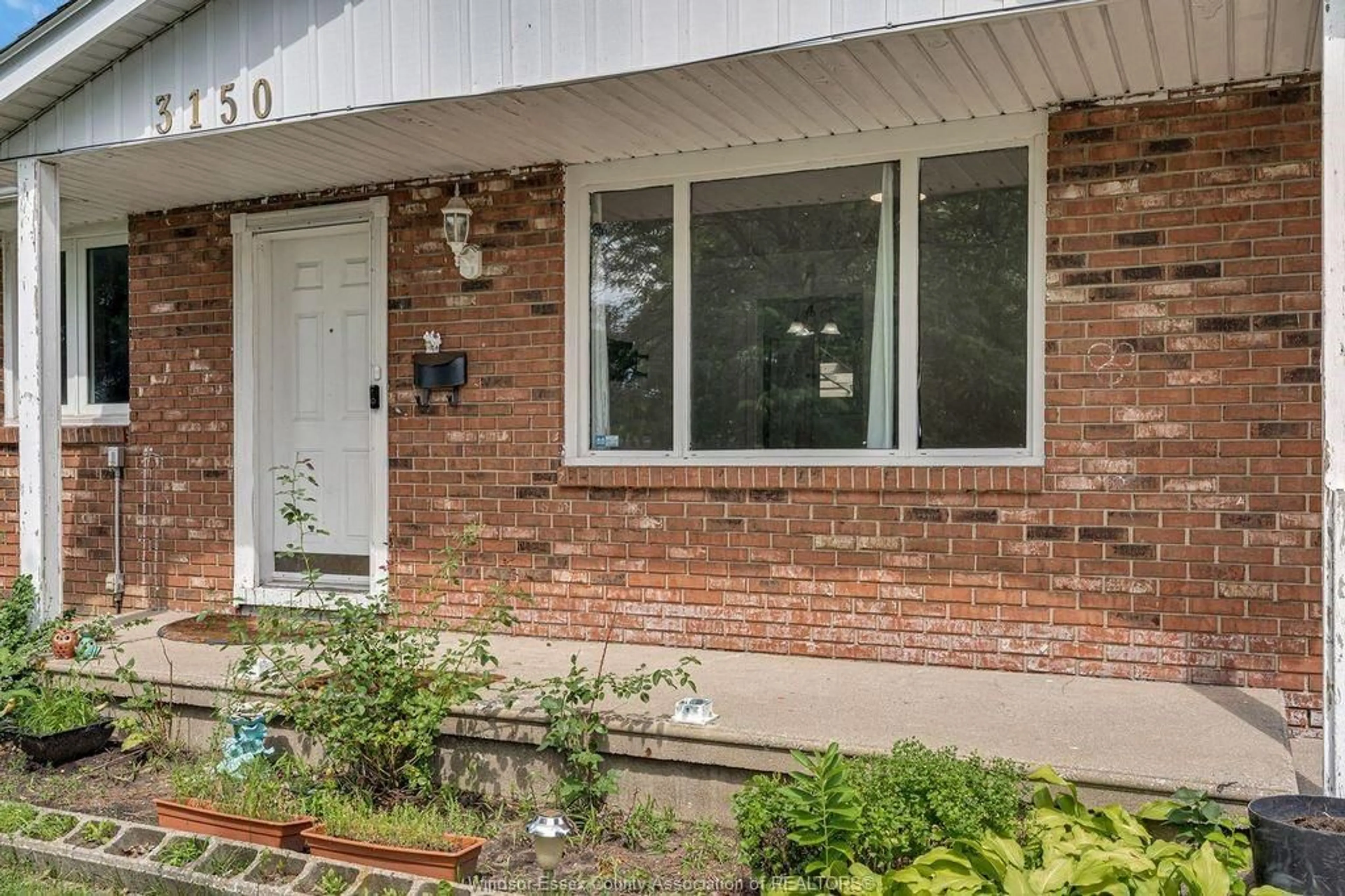 Home with brick exterior material, street for 3150 FOREST GLADE, Windsor Ontario N8R 1Z2