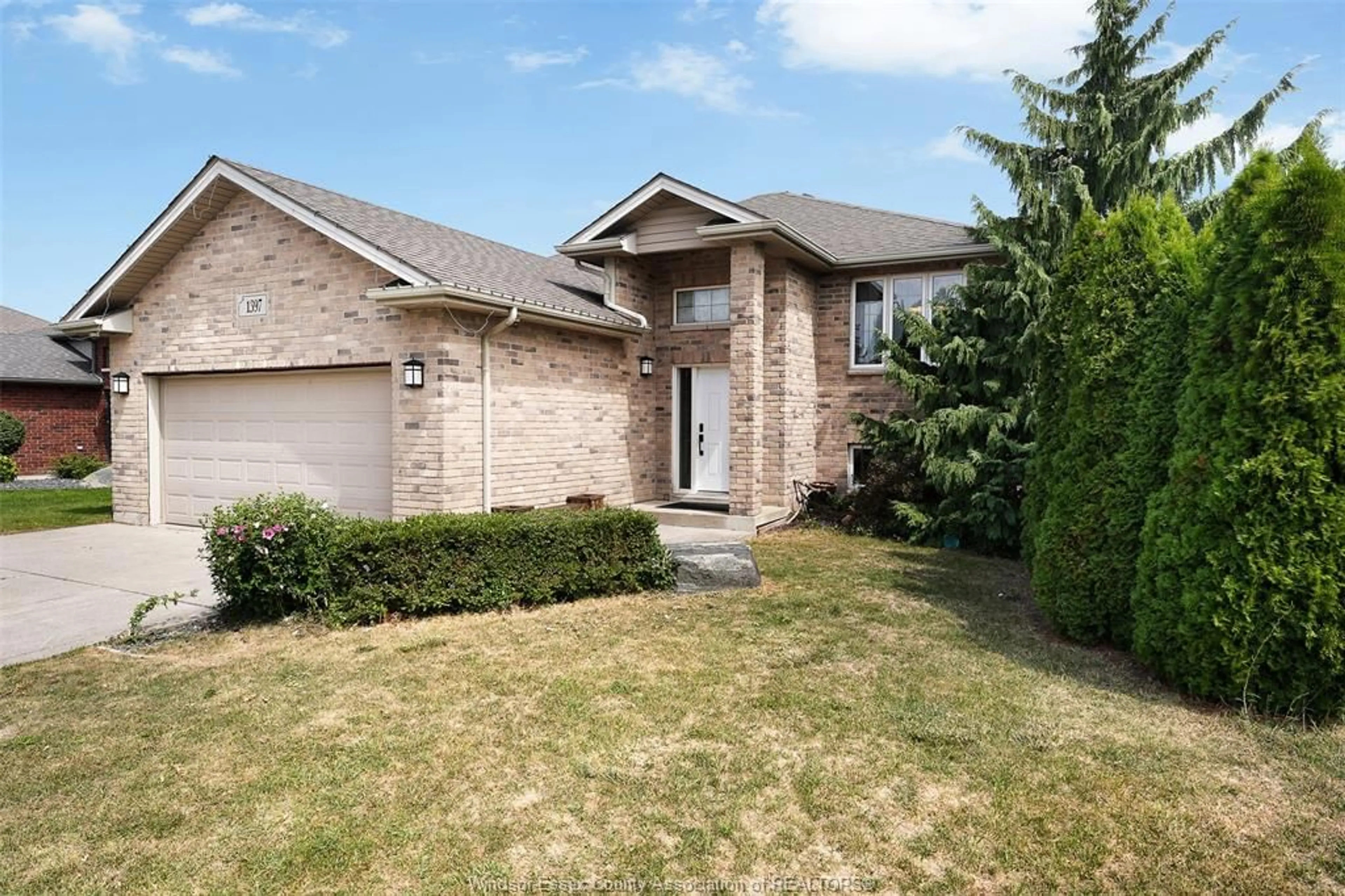 Home with brick exterior material, street for 1397 Crosswinds Dr, Lakeshore Ontario N8L 0S5