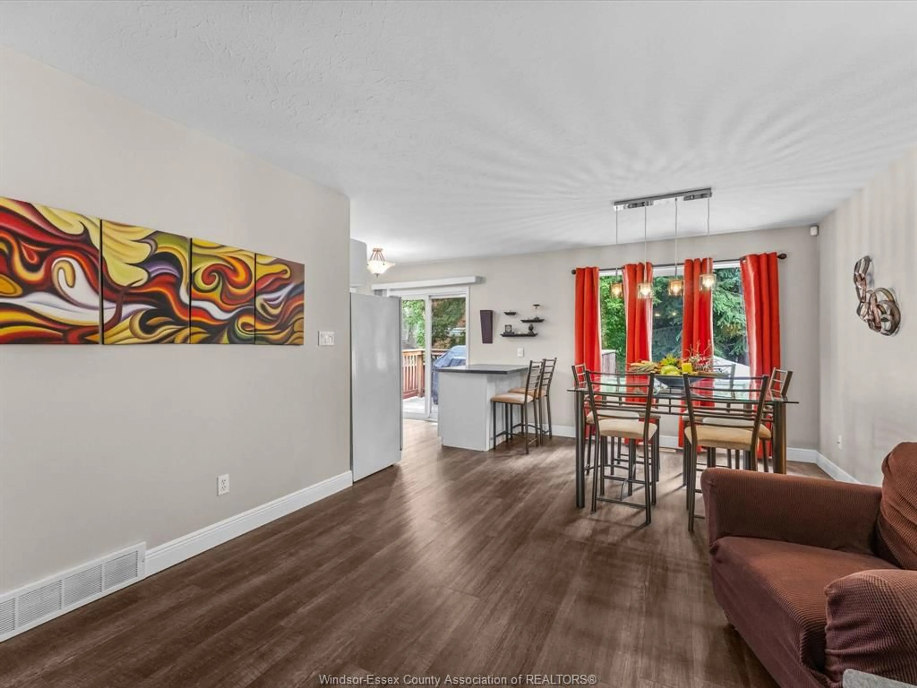 Open concept kitchen, wood/laminate floor for 18 Kirk, Chatham Ontario N7M 3P8