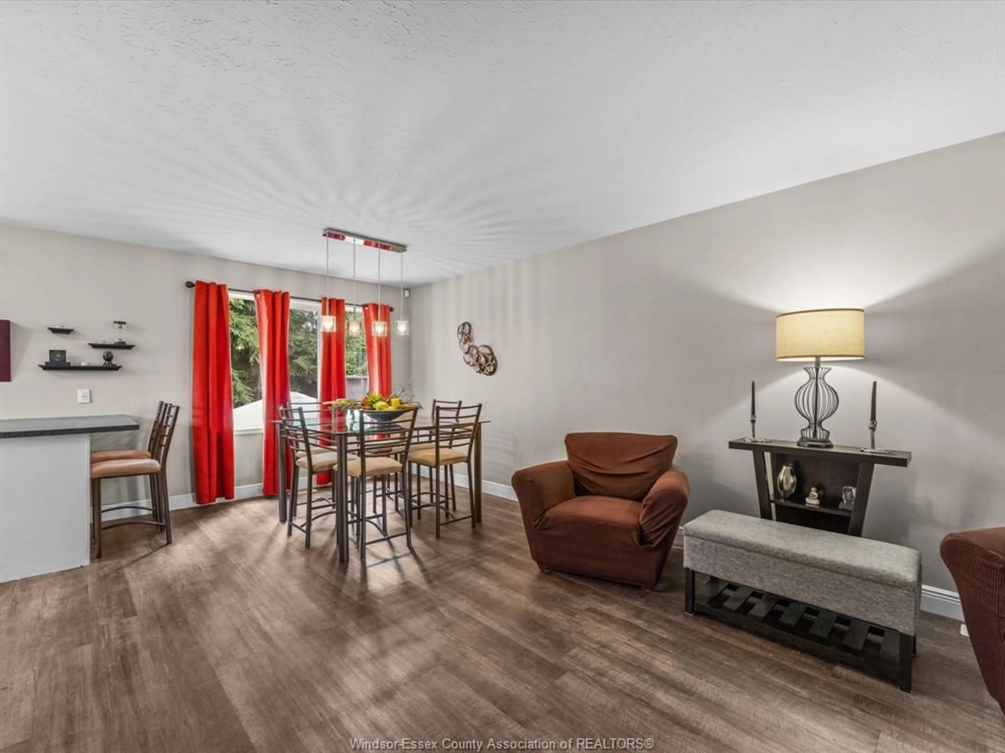 Living room with furniture, wood/laminate floor for 18 Kirk, Chatham Ontario N7M 3P8