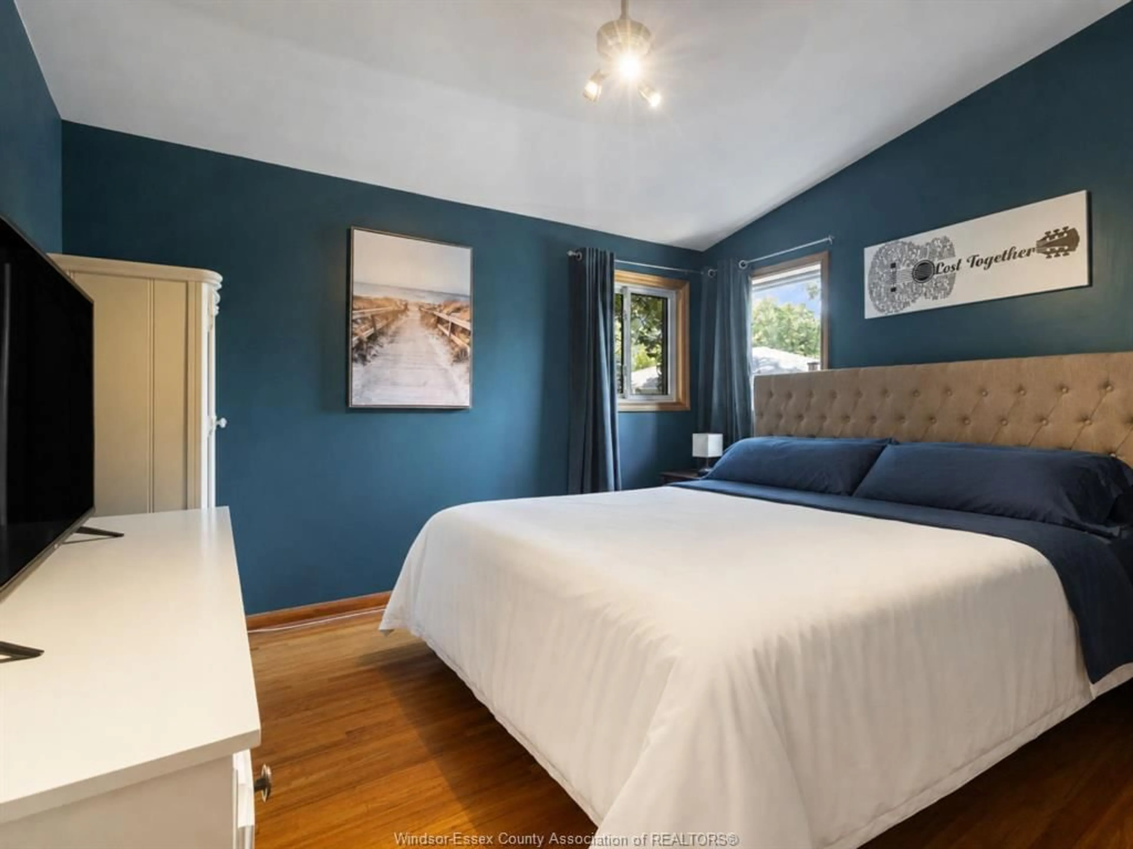 Bedroom with bed, wood/laminate floor for 2763 EVERTS Ave, Windsor Ontario N9E 2T9
