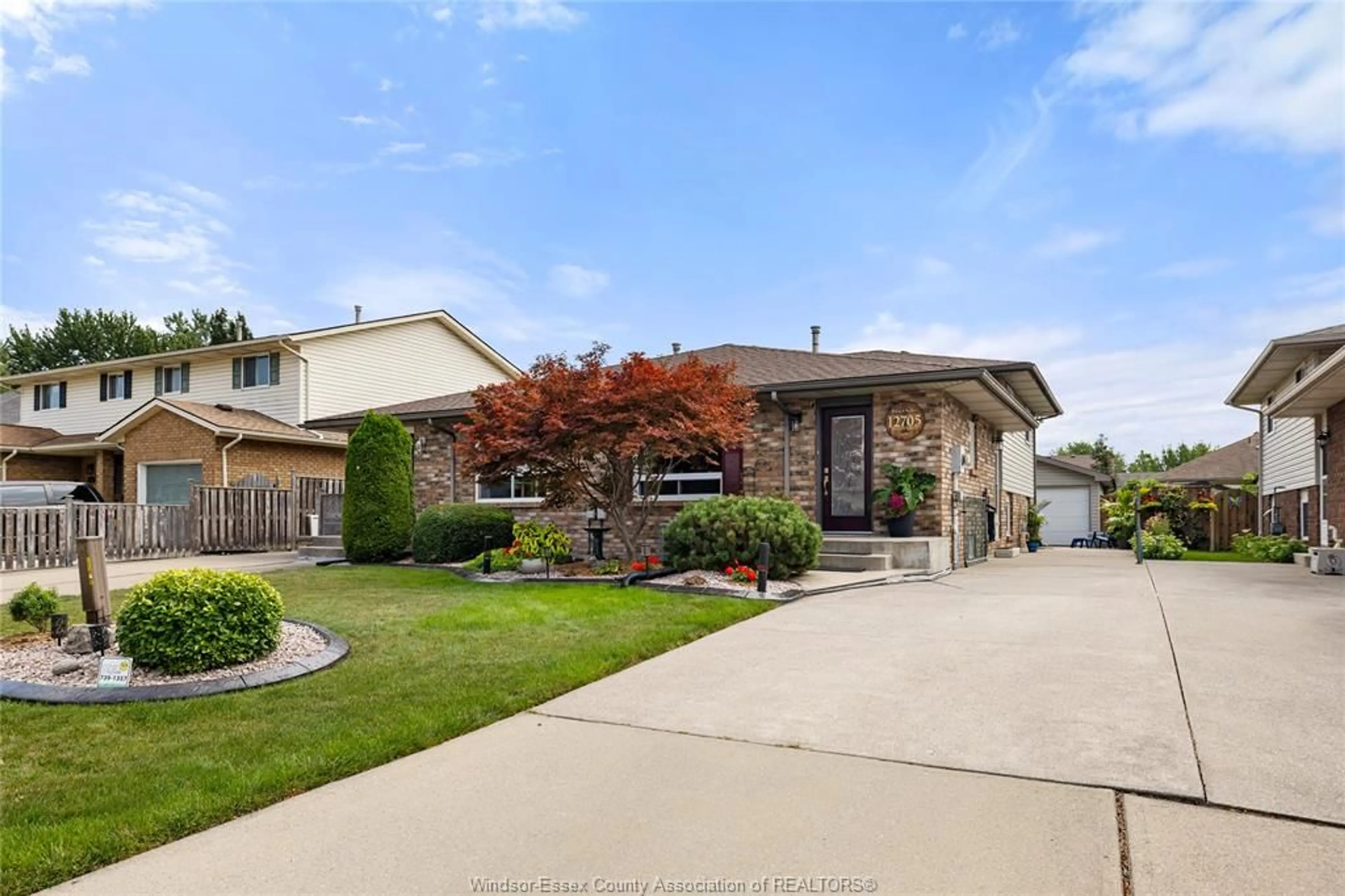 Home with brick exterior material, street for 12705 HORWOOD Cres, Tecumseh Ontario N8N 4T9