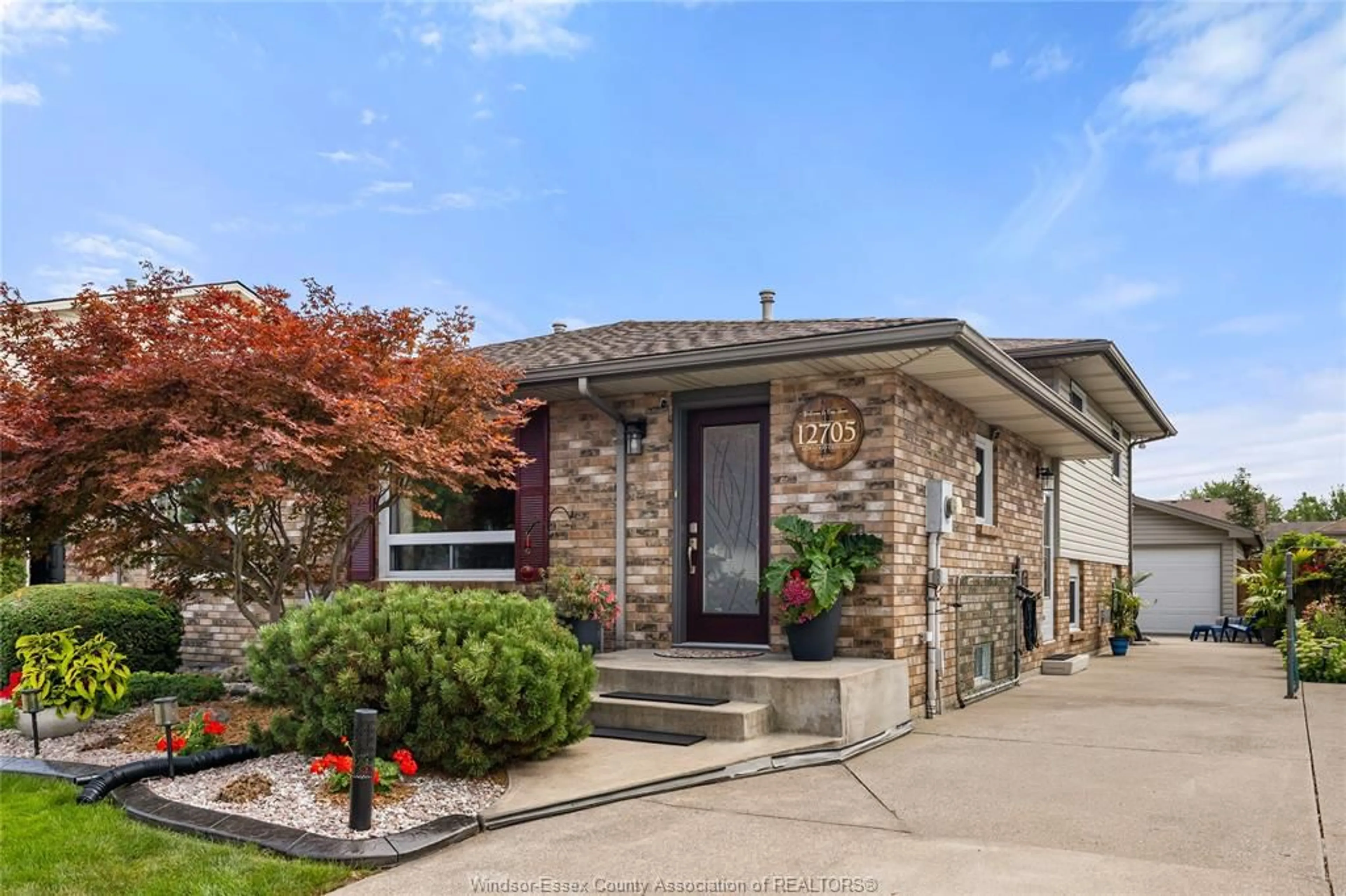 Home with brick exterior material, street for 12705 HORWOOD Cres, Tecumseh Ontario N8N 4T9
