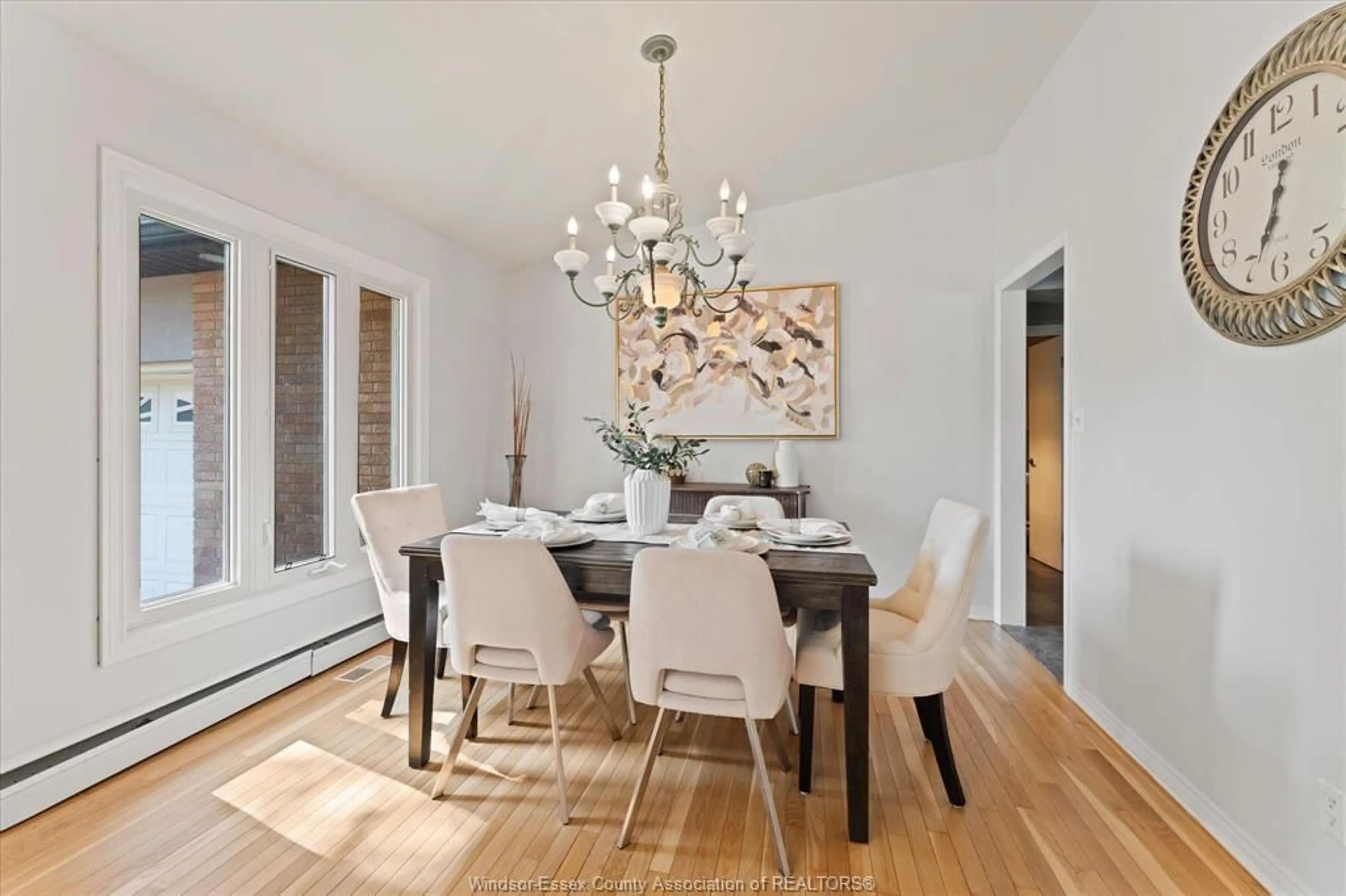 Dining room, wood/laminate floor for 3740 OUELLETTE, Windsor Ontario N9E 3M7