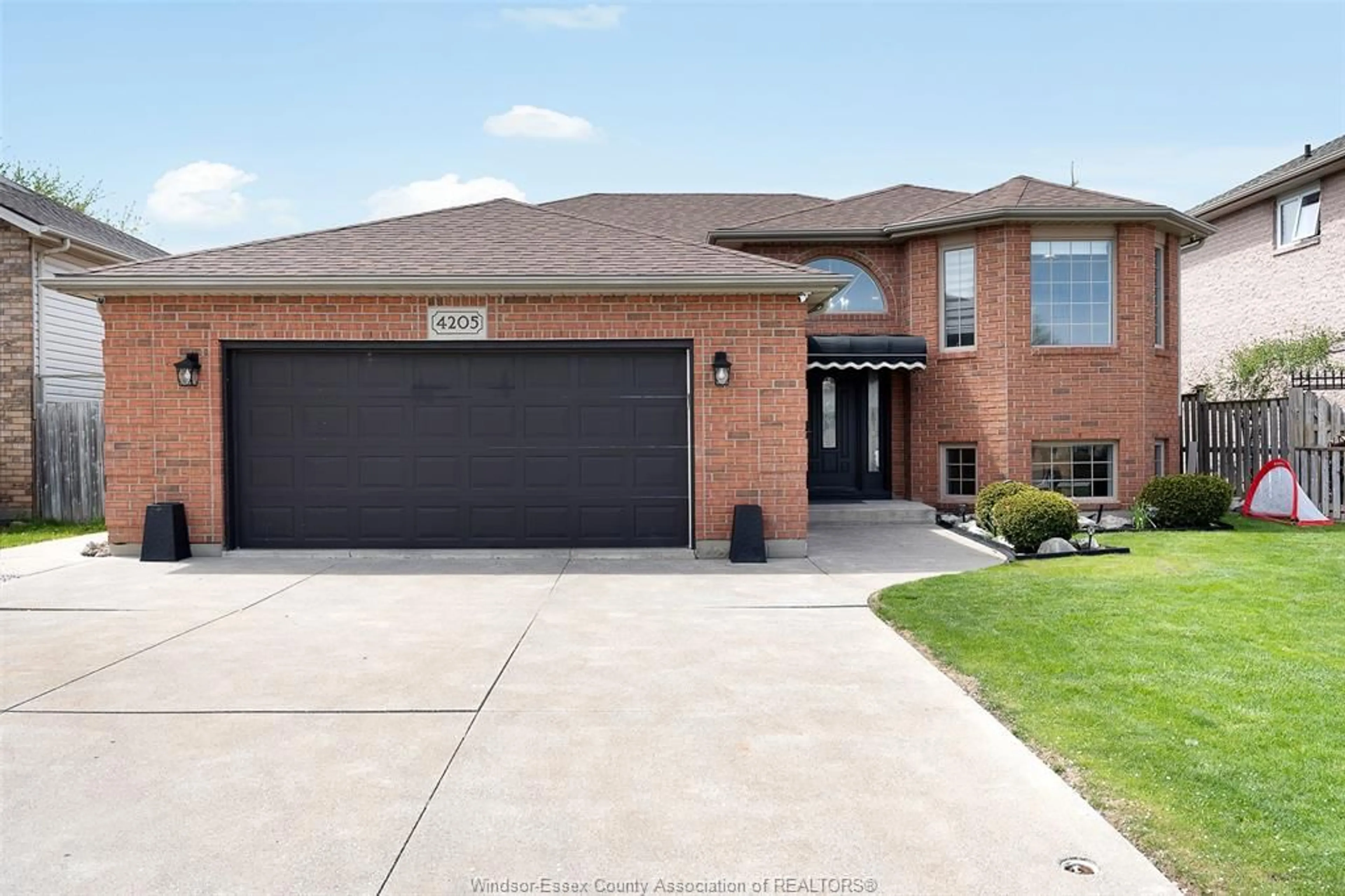 Home with brick exterior material, street for 4205 BARTON Cres, Windsor Ontario N9G 2V5