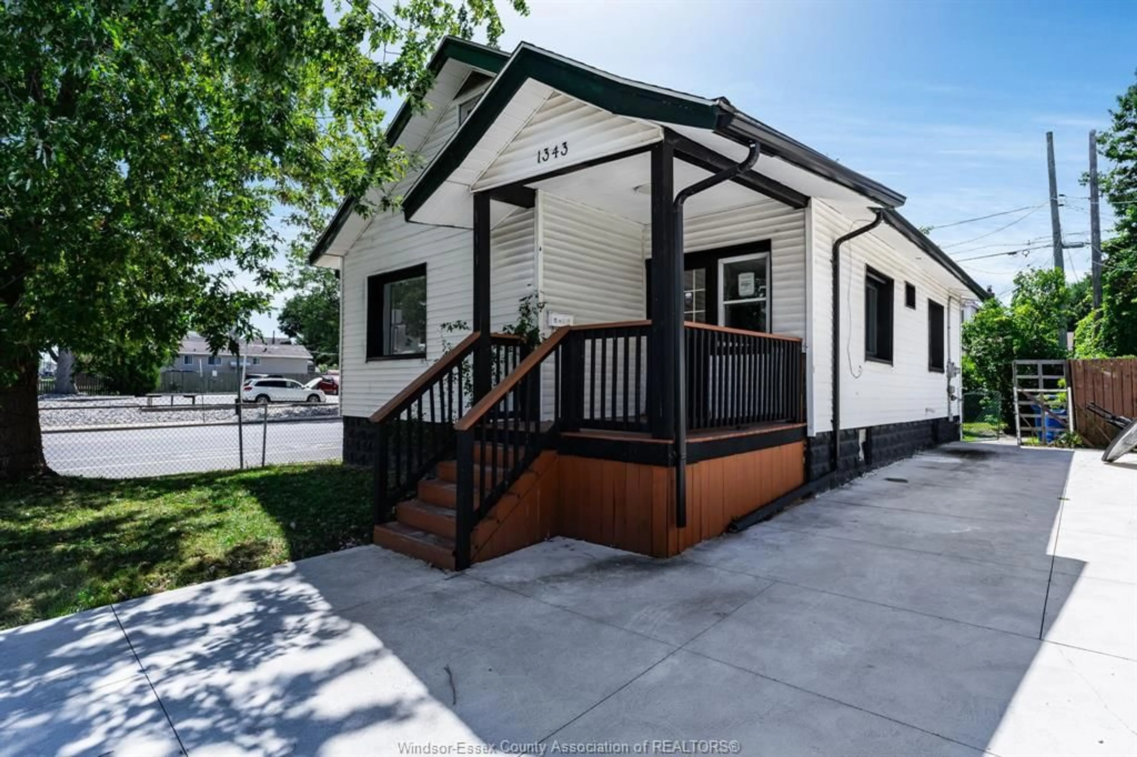 Home with vinyl exterior material, street for 1343 Lillian, Windsor Ontario N8X 4A4