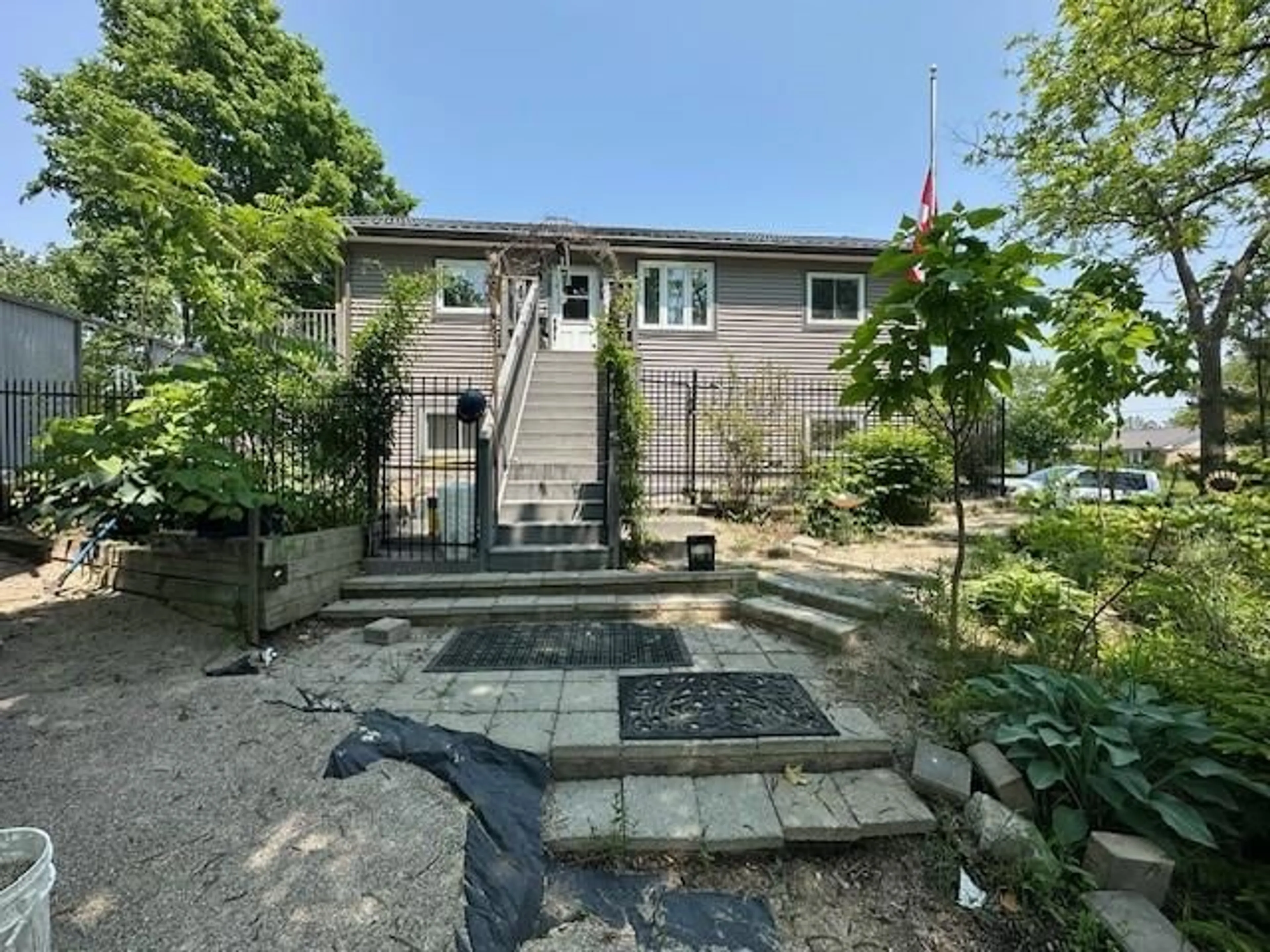 A pic from outside/outdoor area/front of a property/back of a property/a pic from drone, street for 1856/1860 LONMGWOODS Rd, Wardsville Ontario N0L 2N0