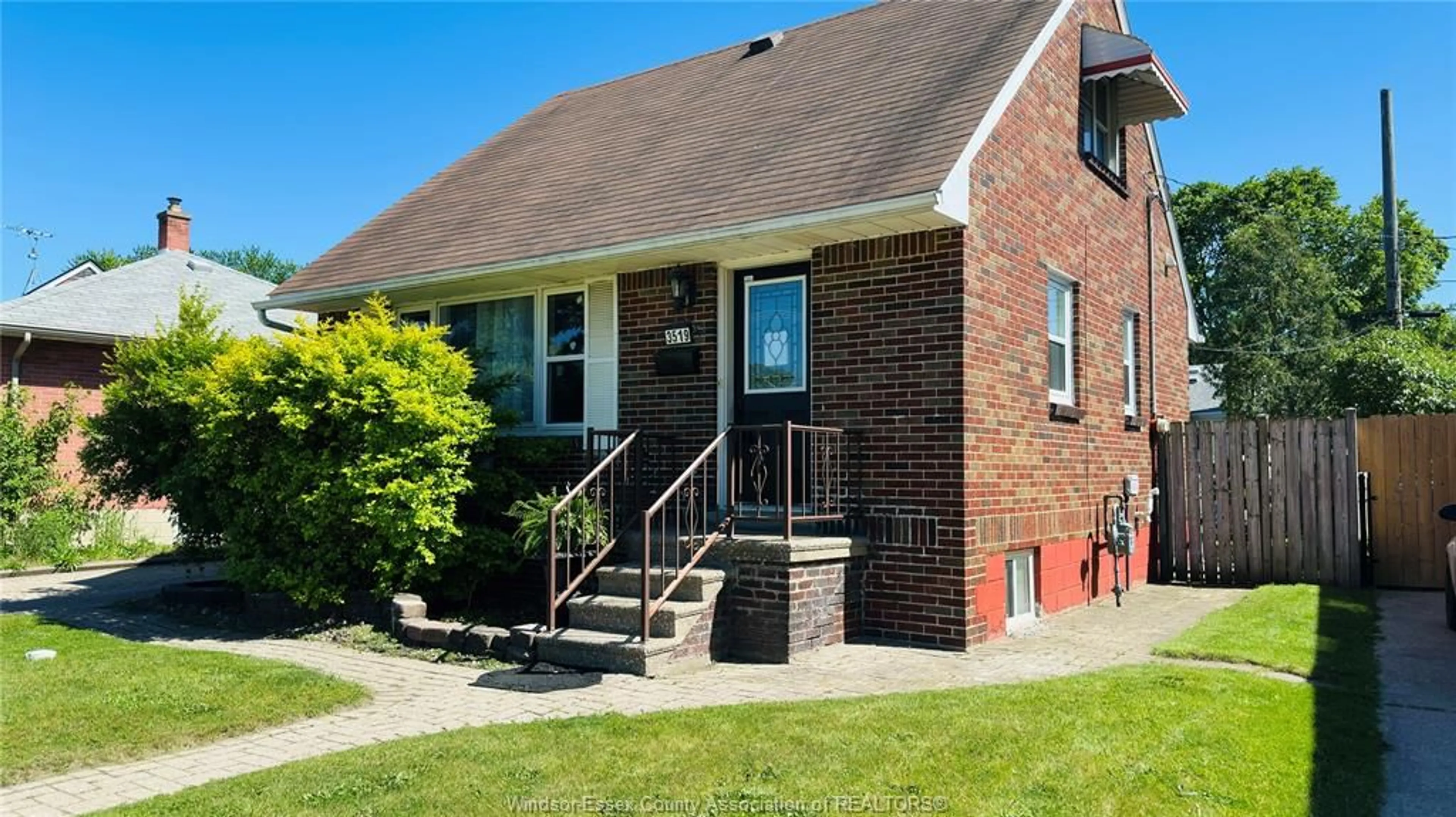 Home with brick exterior material, street for 3519 TECUMSEH Rd, Windsor Ontario N9C 2B6