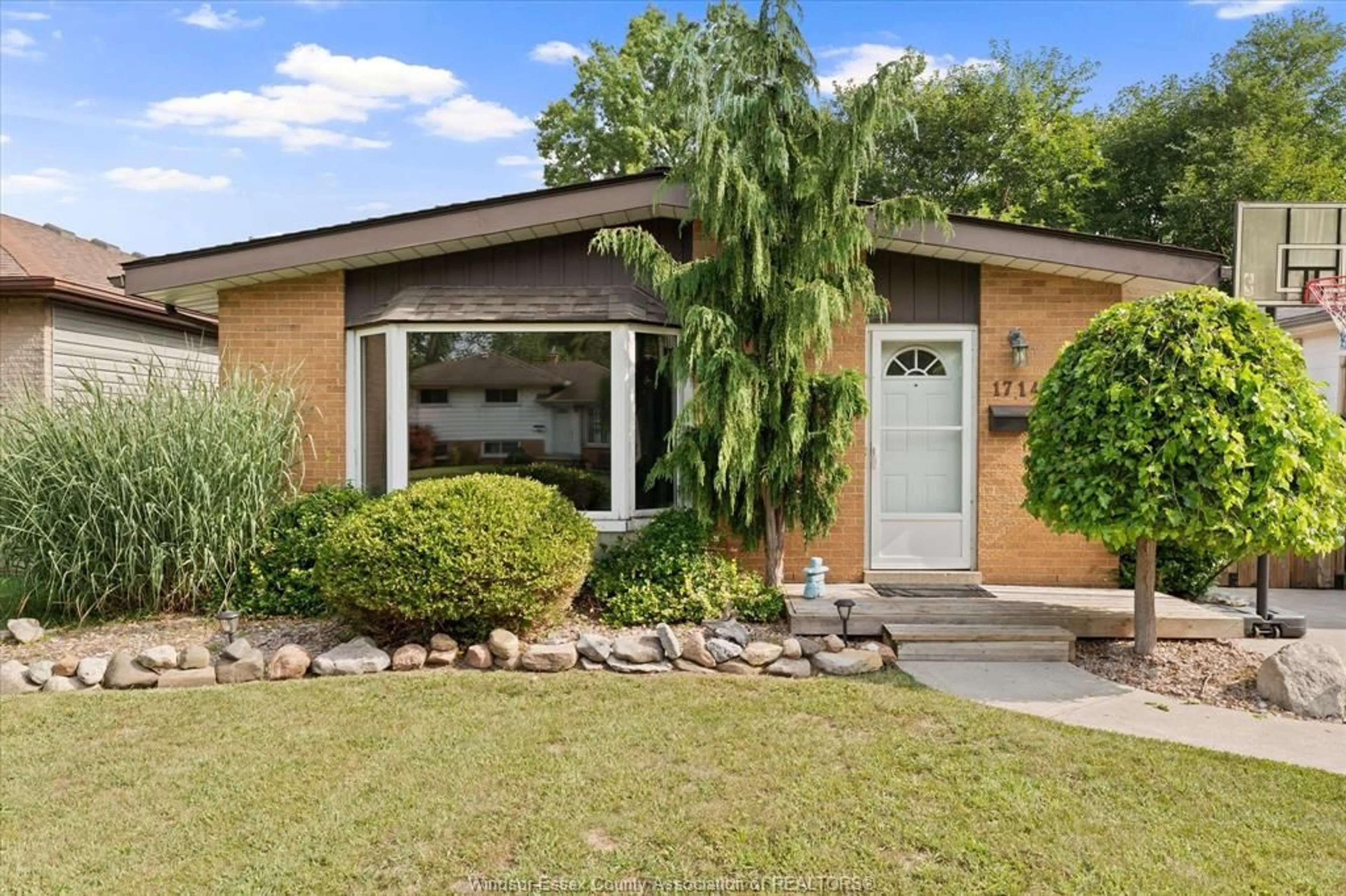 Home with brick exterior material, street for 1714 SUN VALLEY Dr, Windsor Ontario N9C 3R2