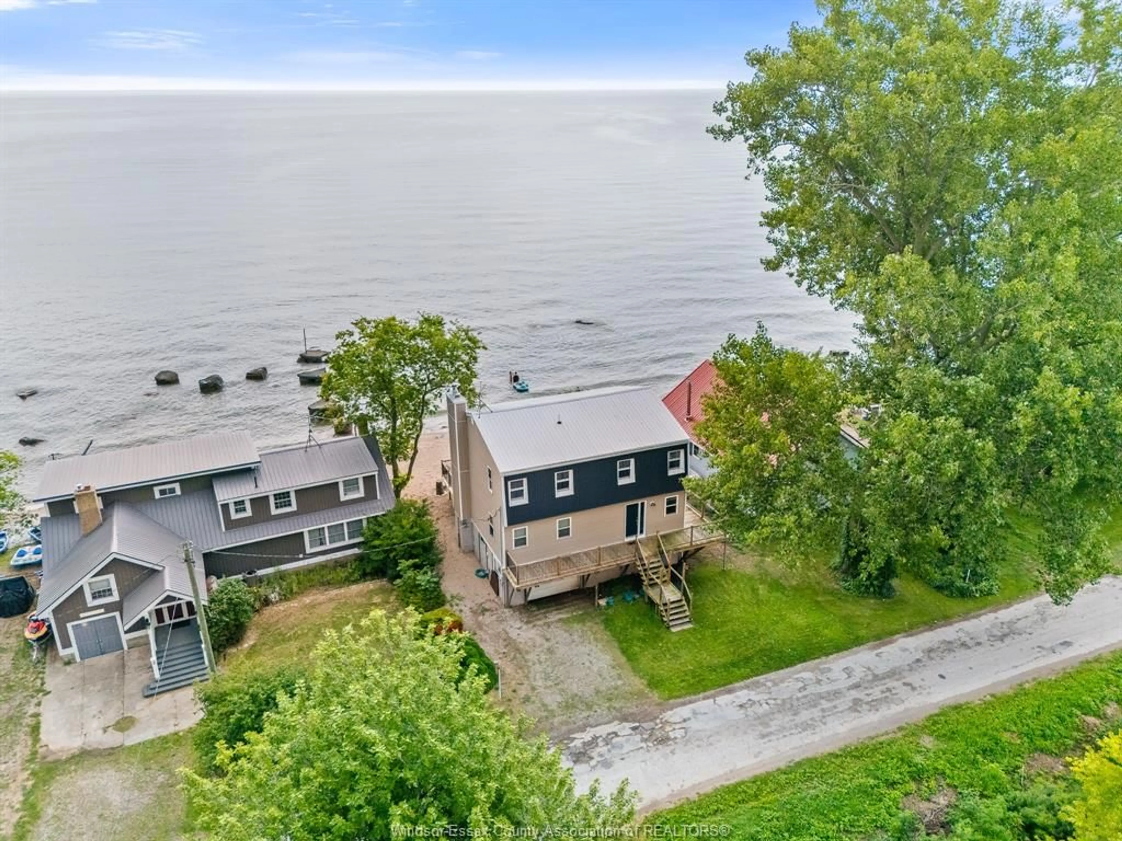 A pic from outside/outdoor area/front of a property/back of a property/a pic from drone, water/lake/river/ocean view for 1435 EAST SHORE Rd, Pelee Island Ontario N0R 1M0