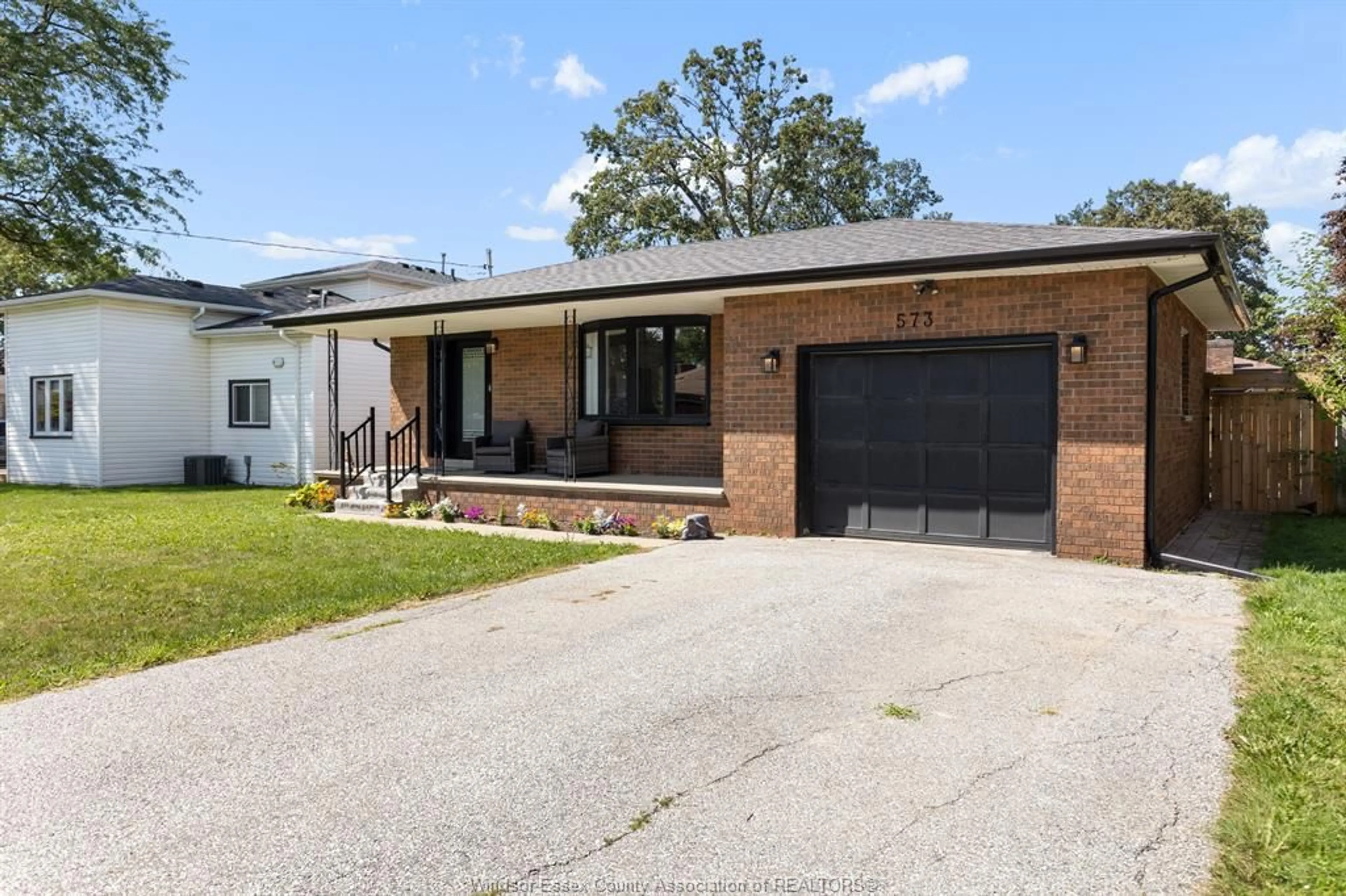 Home with brick exterior material, street for 573 LESPERANCE Rd, Tecumseh Ontario N8W 1W5