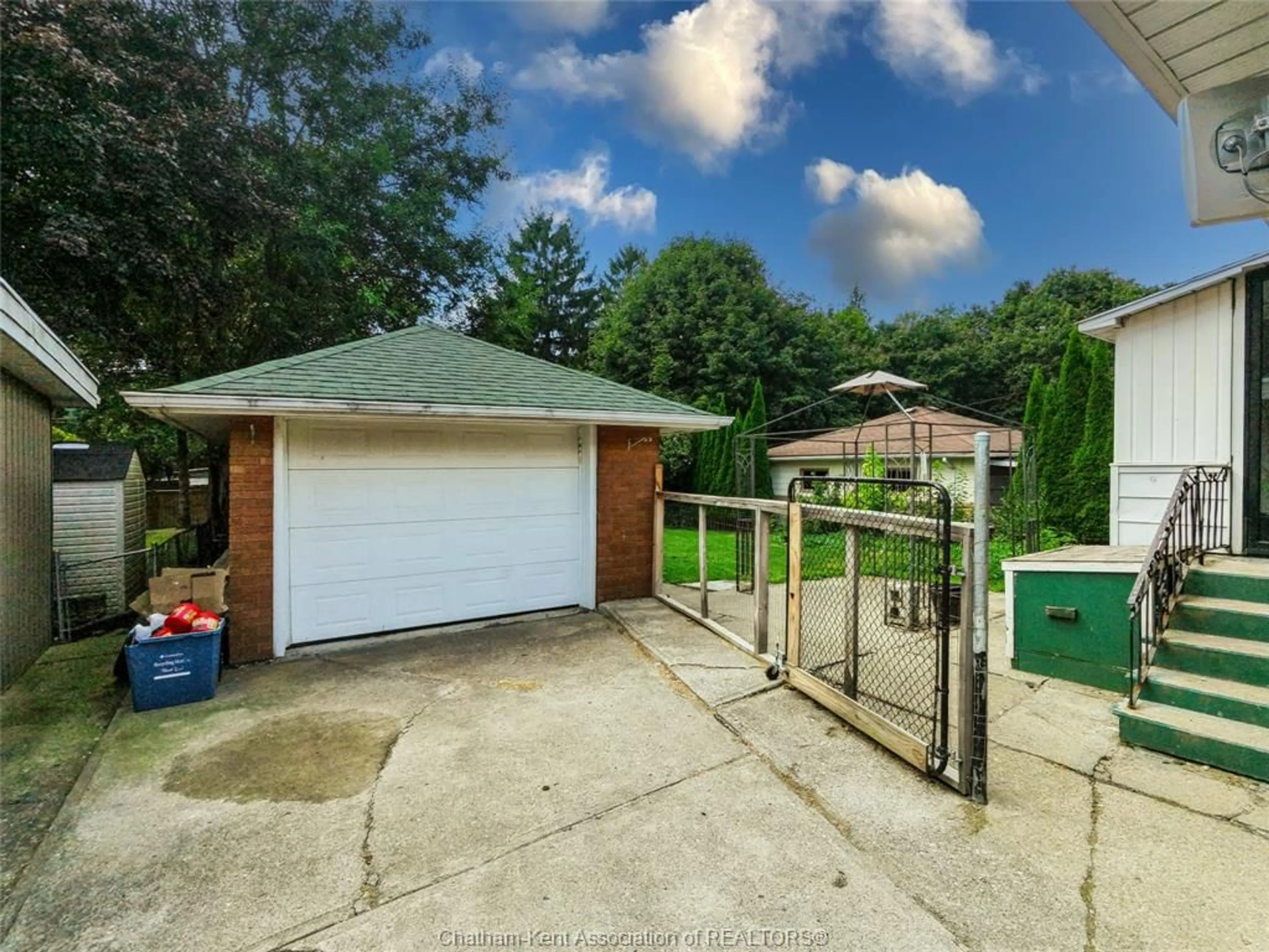 A pic from outside/outdoor area/front of a property/back of a property/a pic from drone, street for 28 Woodland Ave, Chatham Ontario N7L 2S6