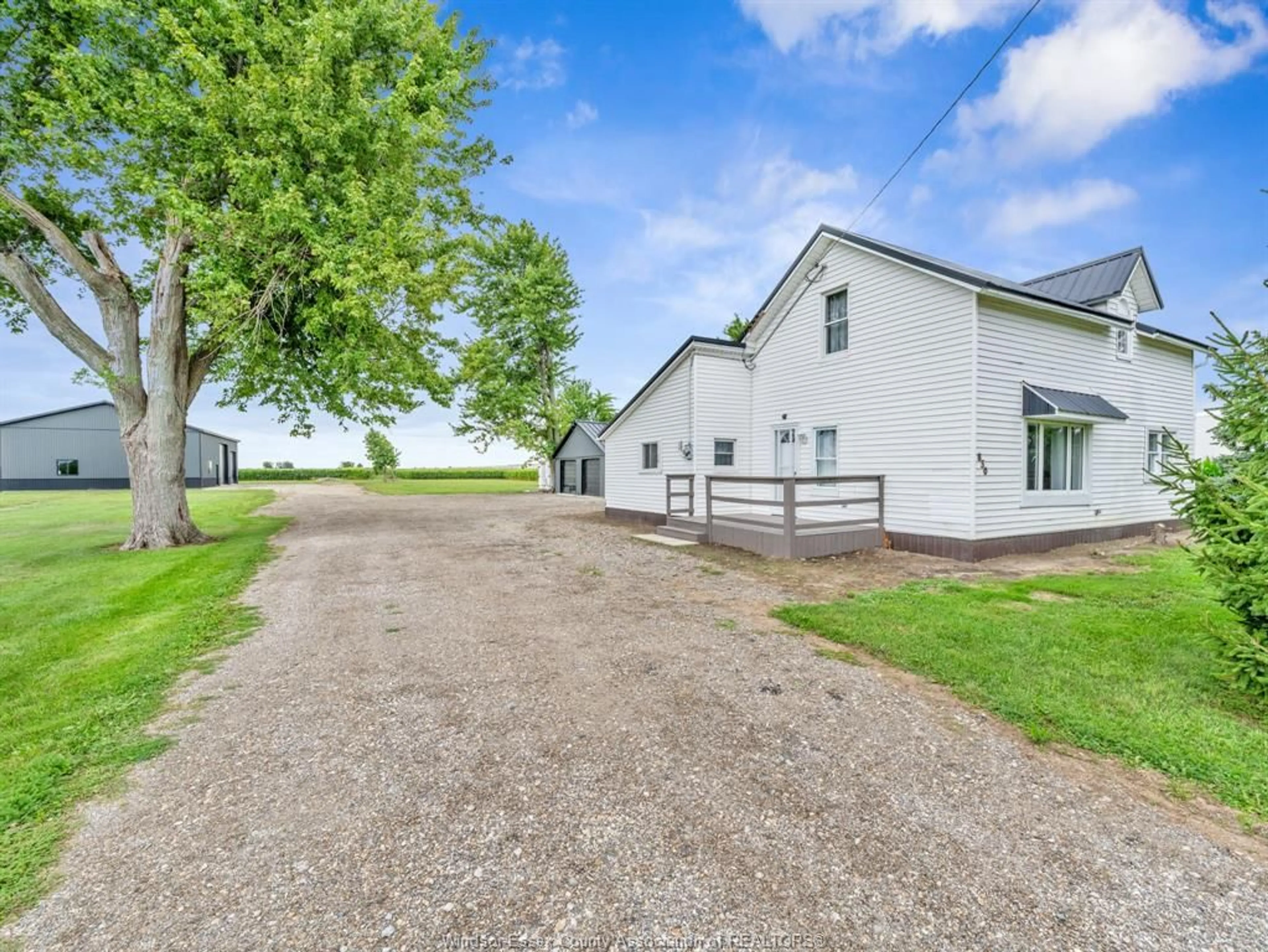 A pic from outside/outdoor area/front of a property/back of a property/a pic from drone, unknown for 830 Mersea Road 10, Leamington Ontario N0P 2J0