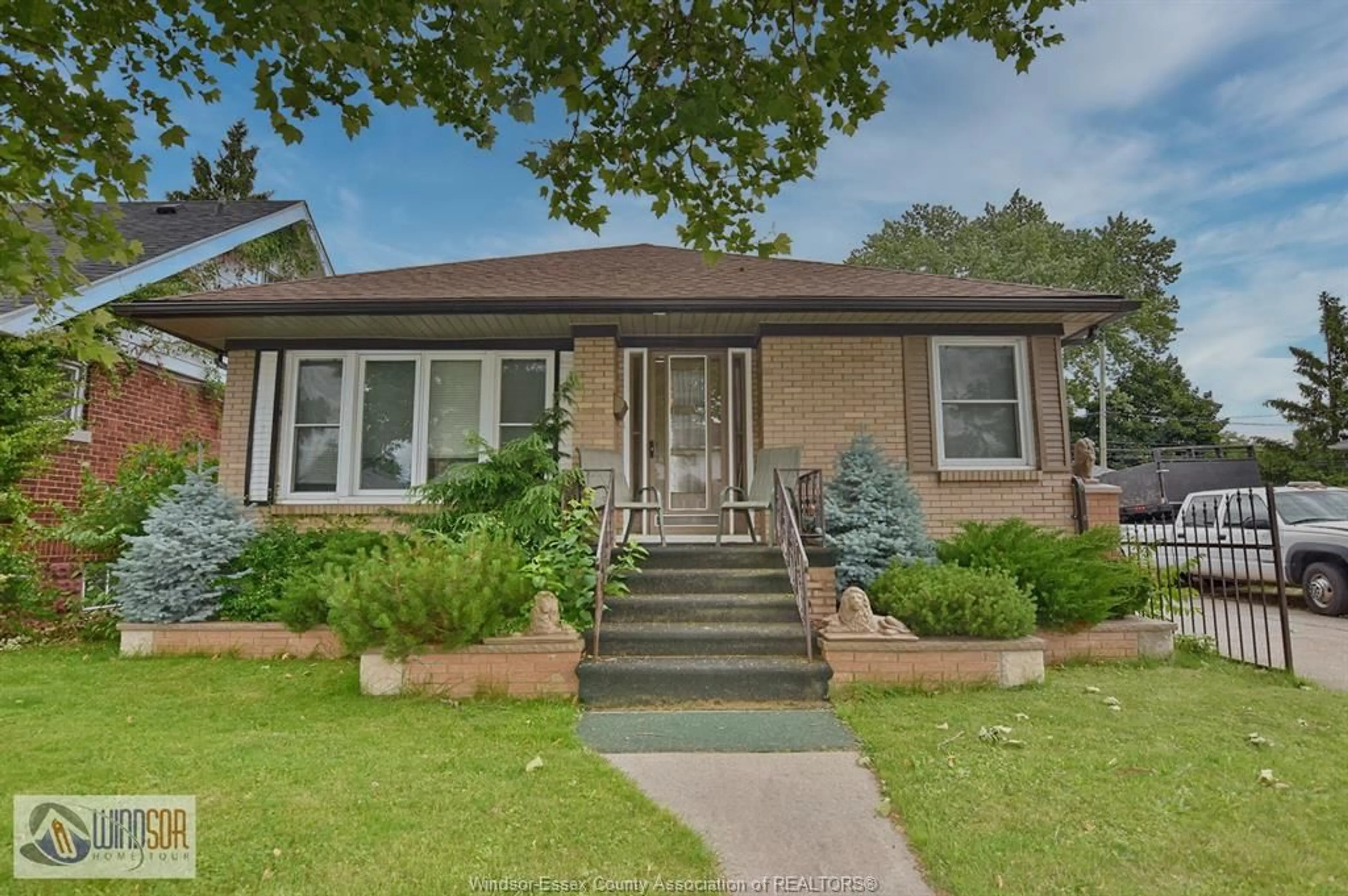 Home with vinyl exterior material, street for 1534 PILLETTE Rd, Windsor Ontario N8Y 3C2