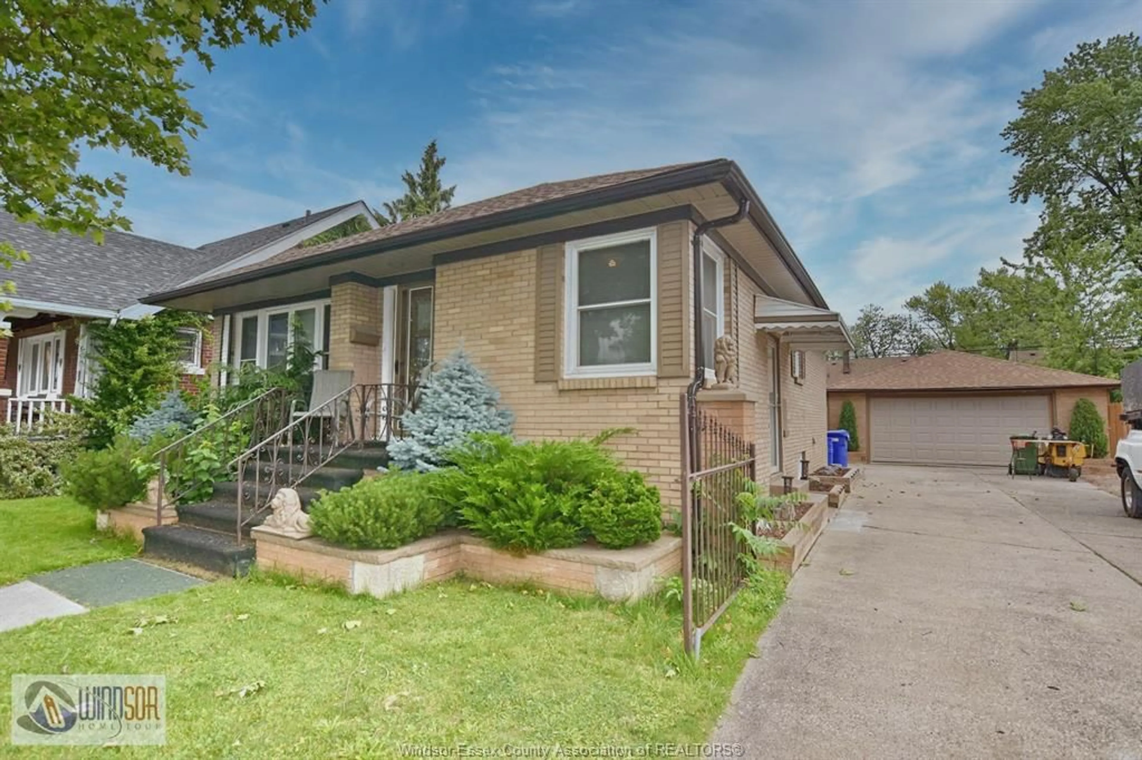 Home with brick exterior material, street for 1534 PILLETTE Rd, Windsor Ontario N8Y 3C2
